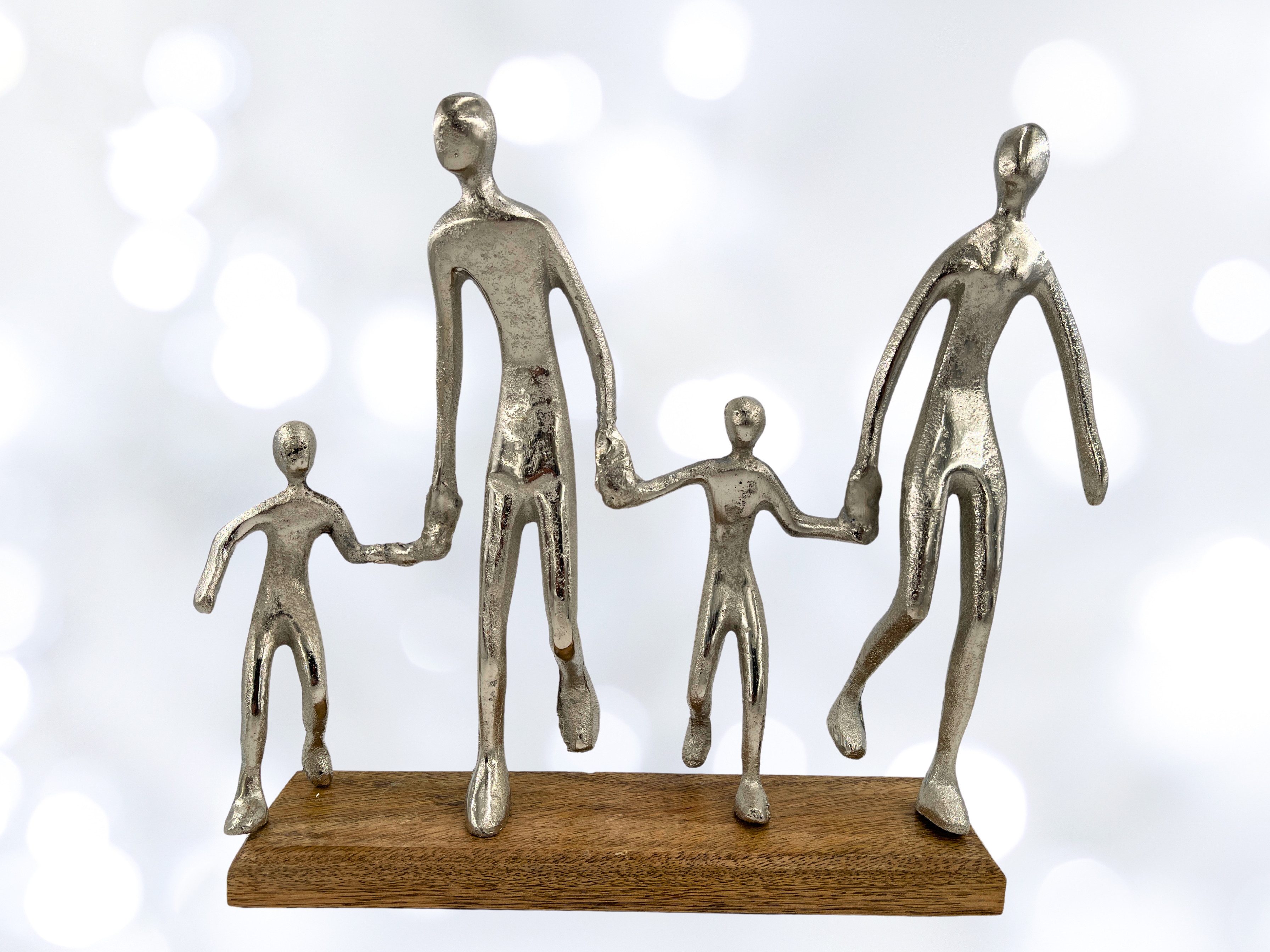 Skulptur Harmonische Familienskulptur in Silber auf Holzsockel Breite 38cm