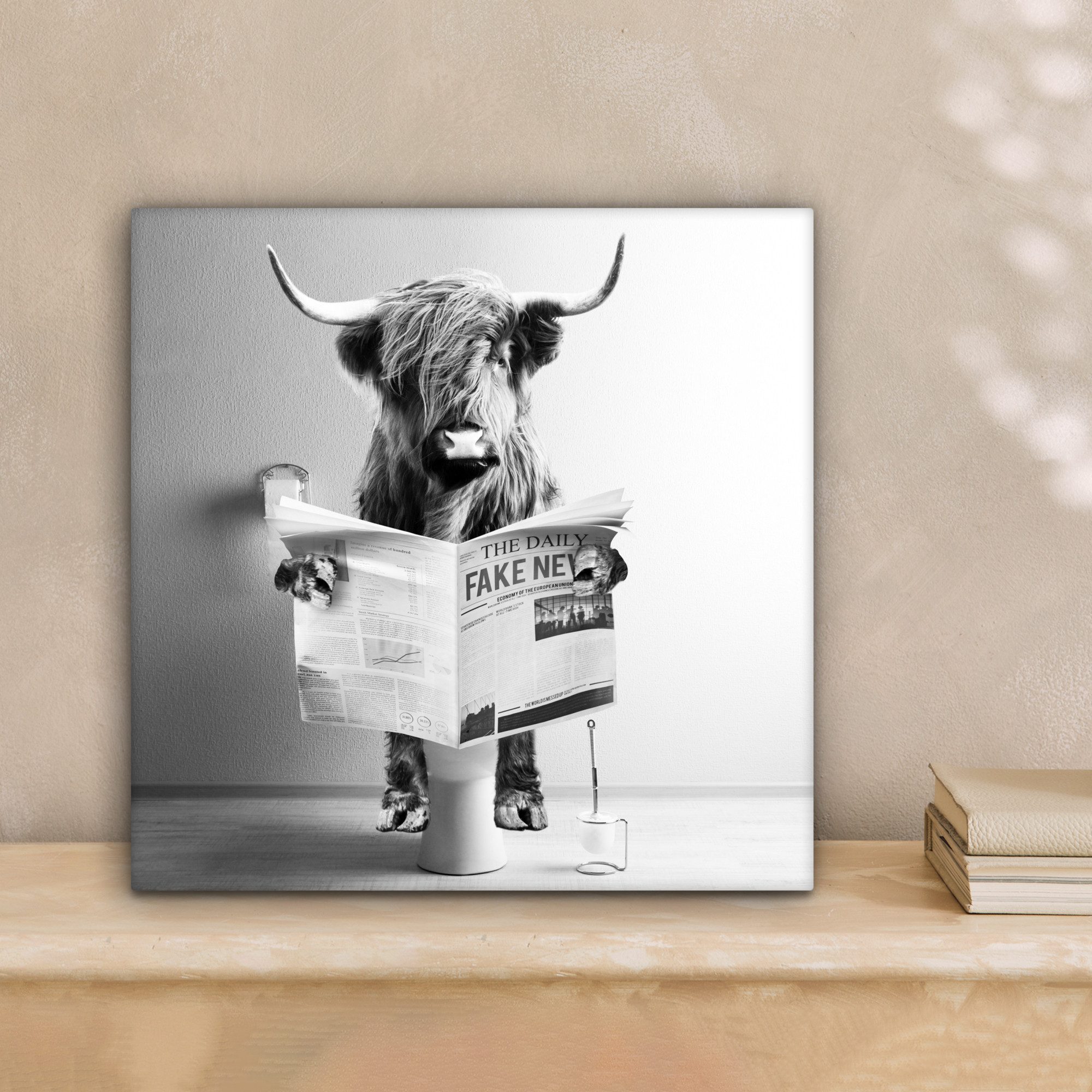 OneMillionCanvasses® Leinwandbild Schottischer Highlander - WC - Zeitung - günstig online kaufen
