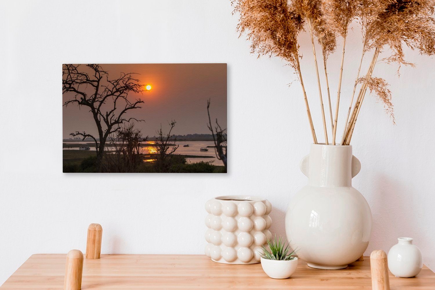 OneMillionCanvasses® Leinwandbild Silhouette Aufhängefertig, Wandbild am Sonnenuntergang Serondela-Fluss St), 30x20 Leinwandbilder, im, Wanddeko, von bei (1 cm Bäumen