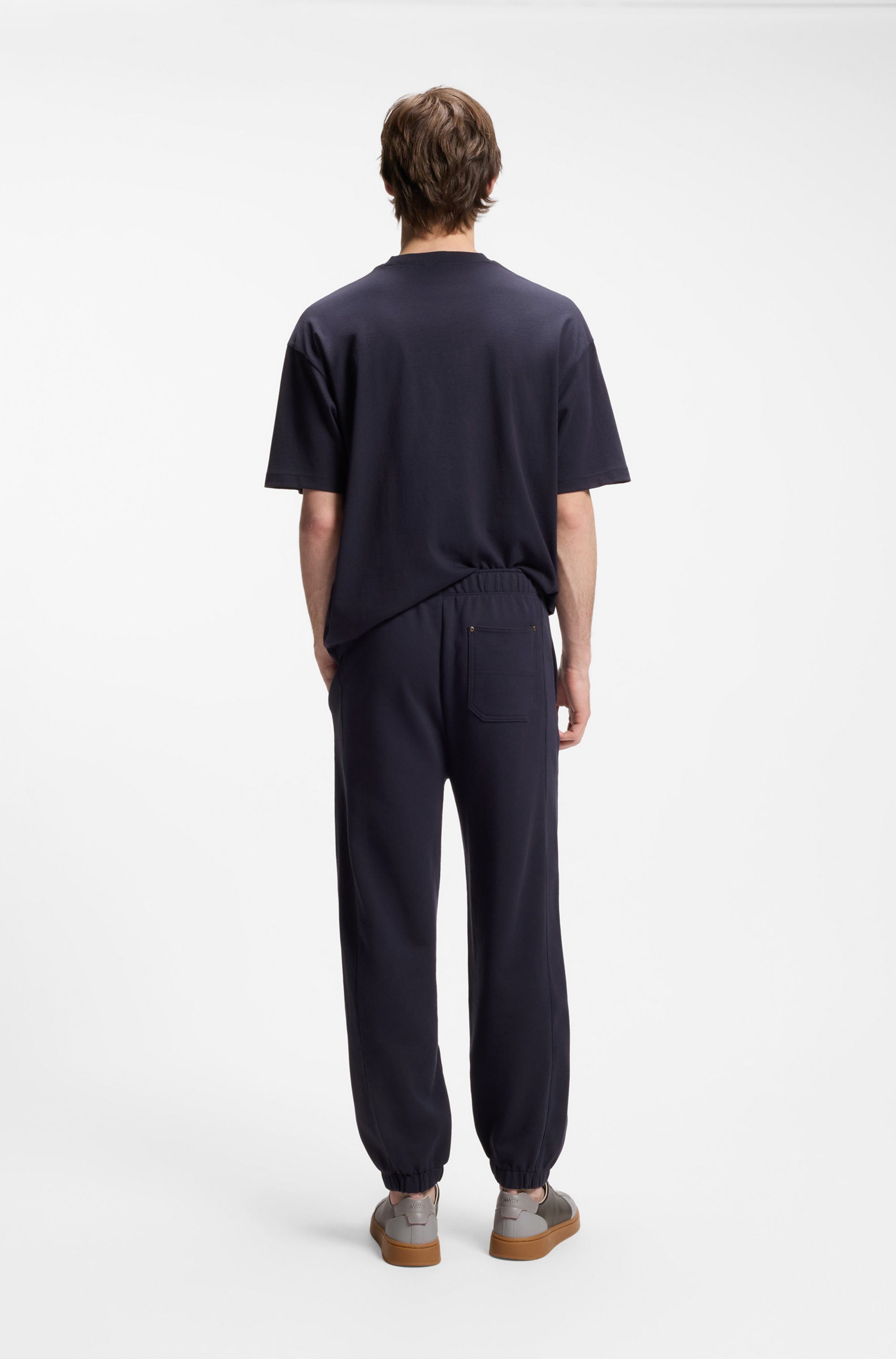 HUGO Sweathose Nevatro Regular Fit, Zierhosenschlitz, elastische Bündchen