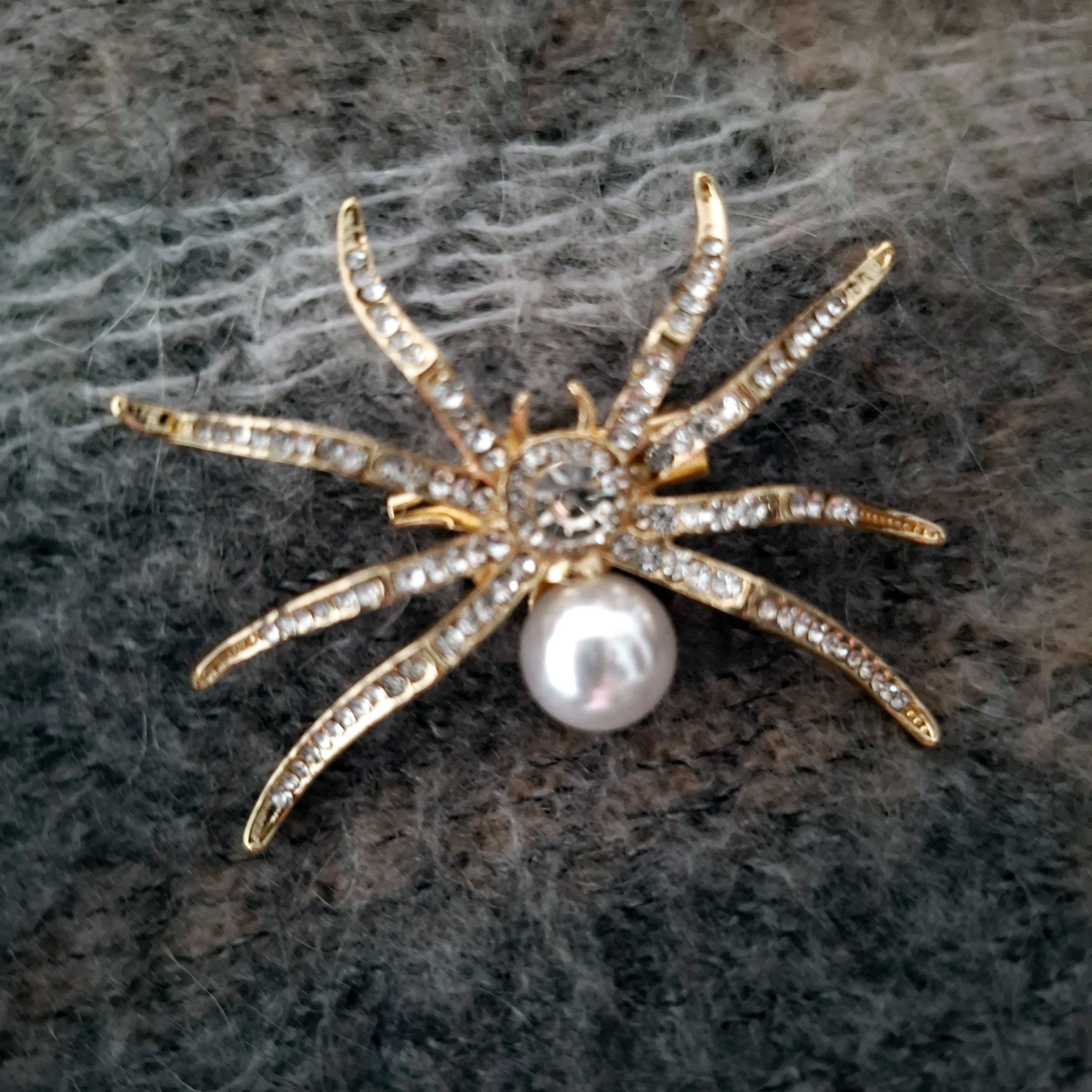 meytrade Brosche Anstecker mit Nadel, Spinne mit Schmucksteinchen und Perle (1-tlg), Schmuckstück für Mottoparty, Kostüm & Halloween