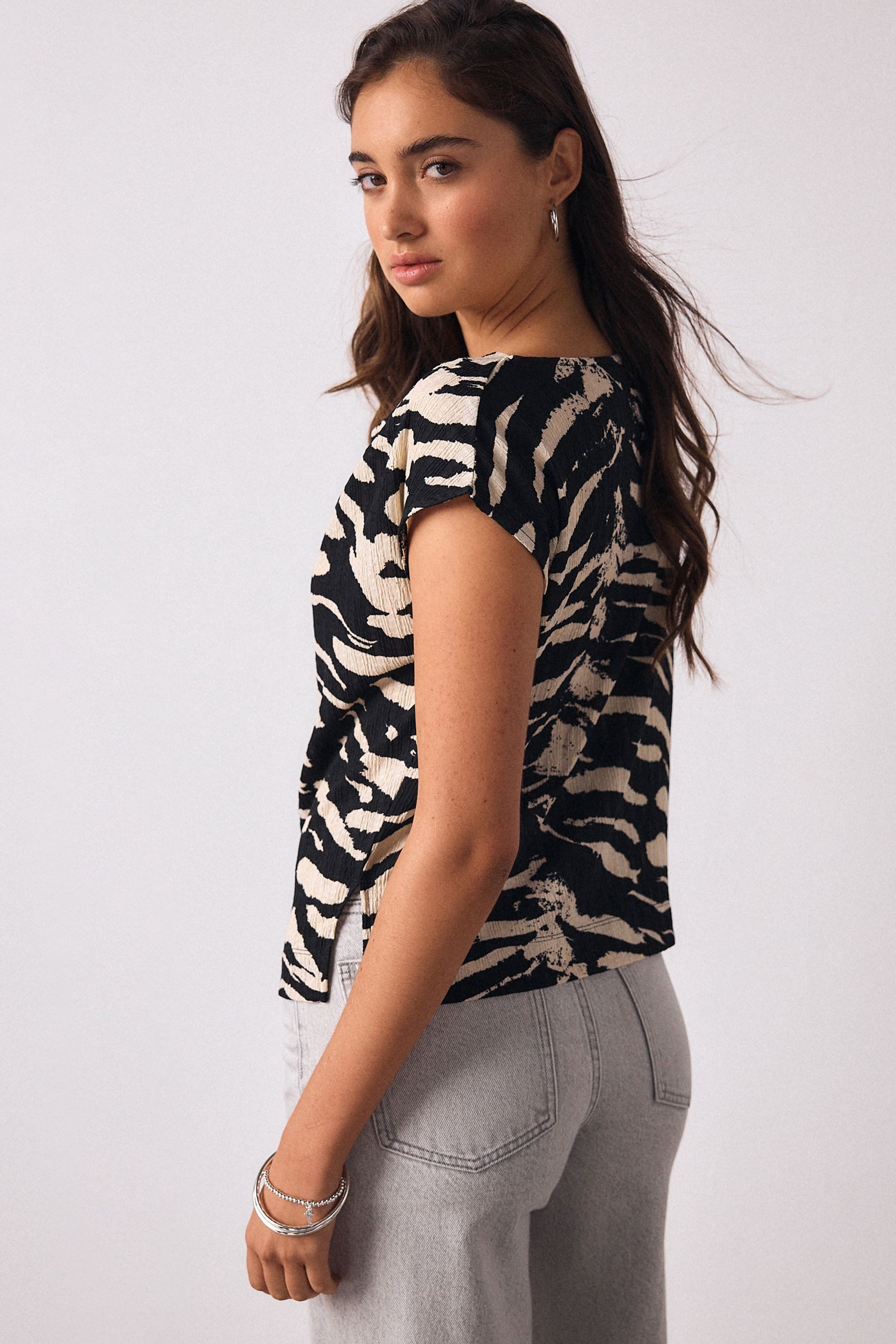 Next Kurzarmbluse Plissiertes Oberteil mit asymmetrischer Drapierung (1-tlg günstig online kaufen