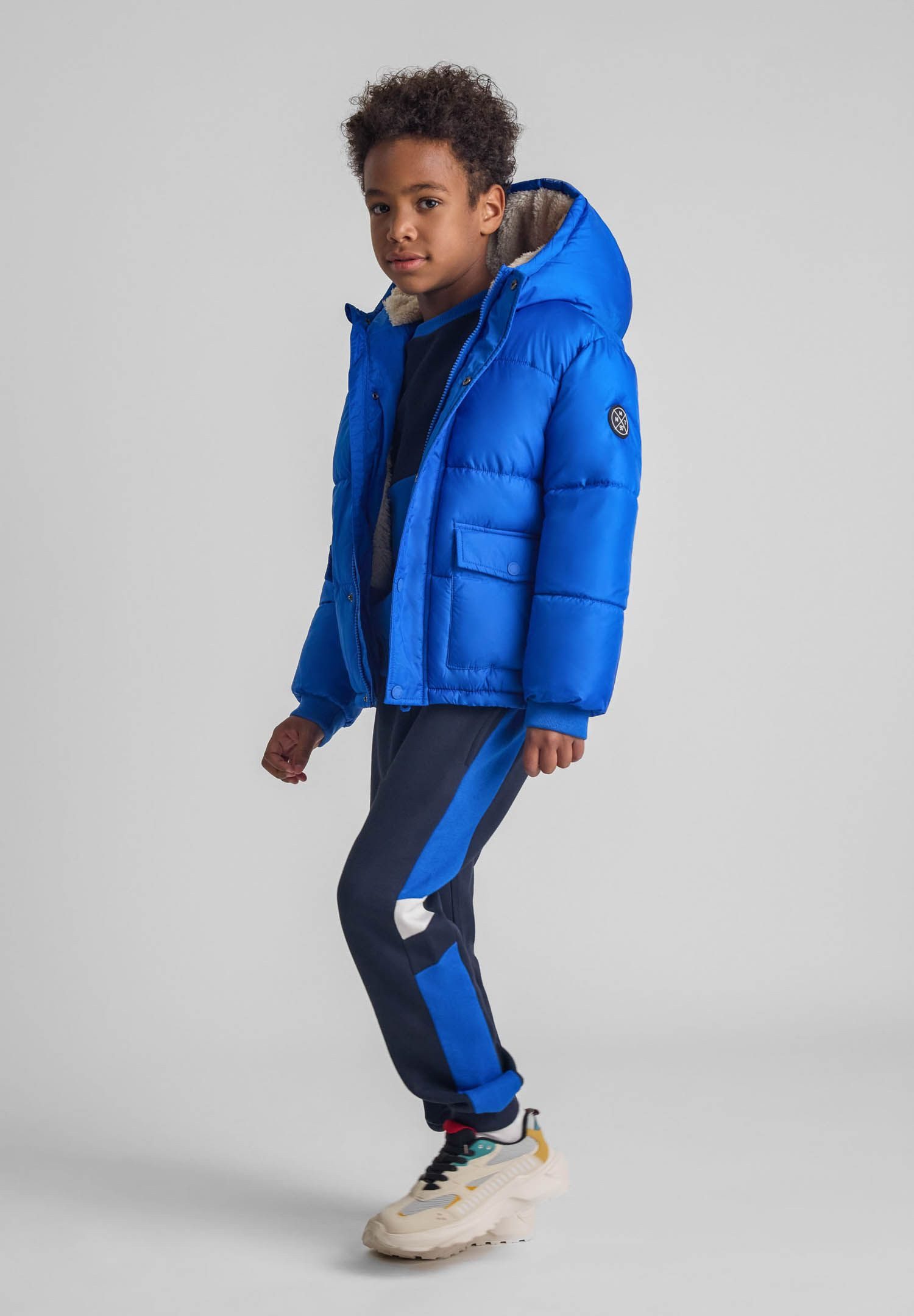 MINOTI Winterjacke Steppjacke mit fester Kapuze (9m-8y) trendiger Aufnäher günstig online kaufen