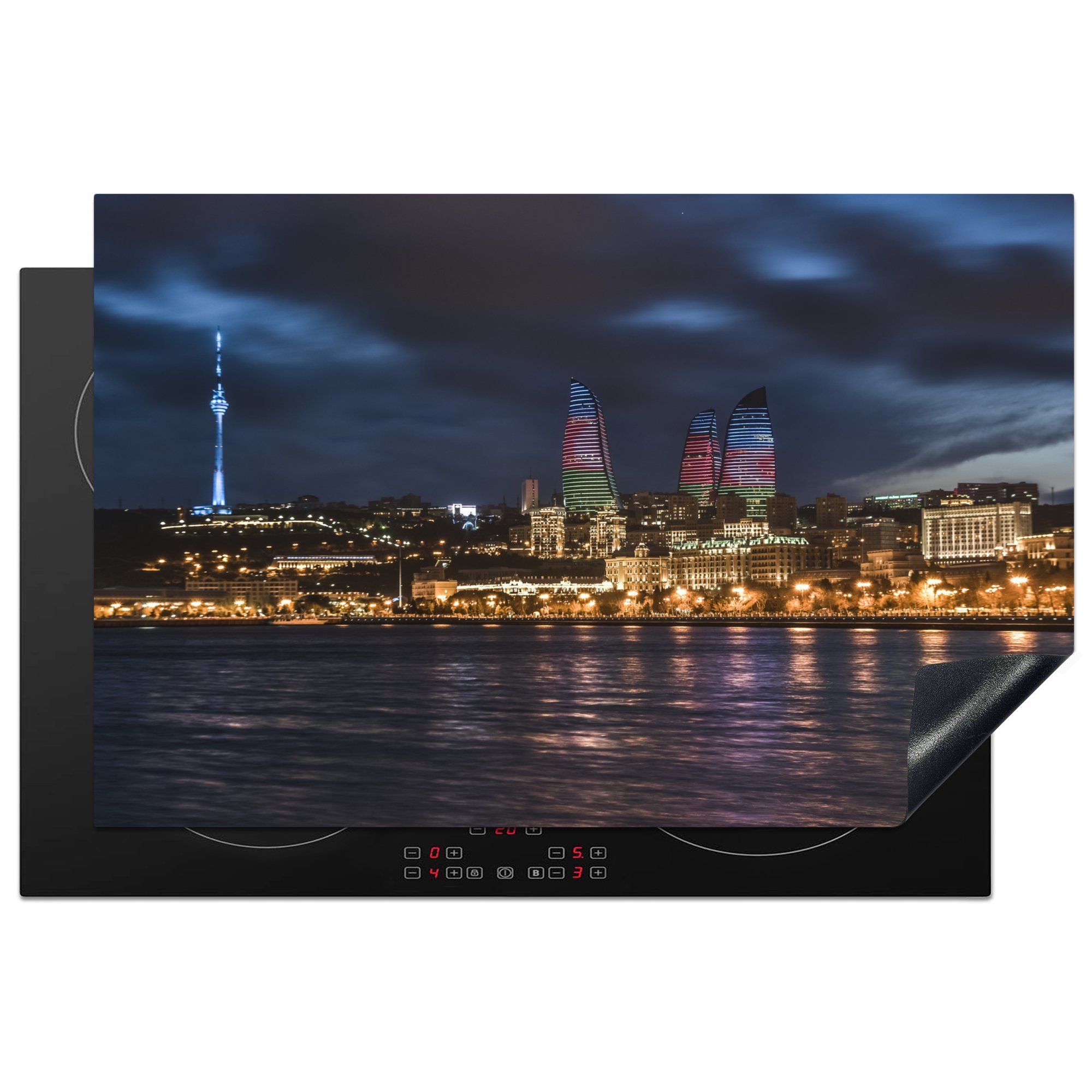 MuchoWow Herdblende-/Abdeckplatte Skyline der Stadt Baku am Abend in Aserbaidschan, Vinyl, (1 tlg), 81x52 cm, Induktionskochfeld Schutz für die küche, Ceranfeldabdeckung