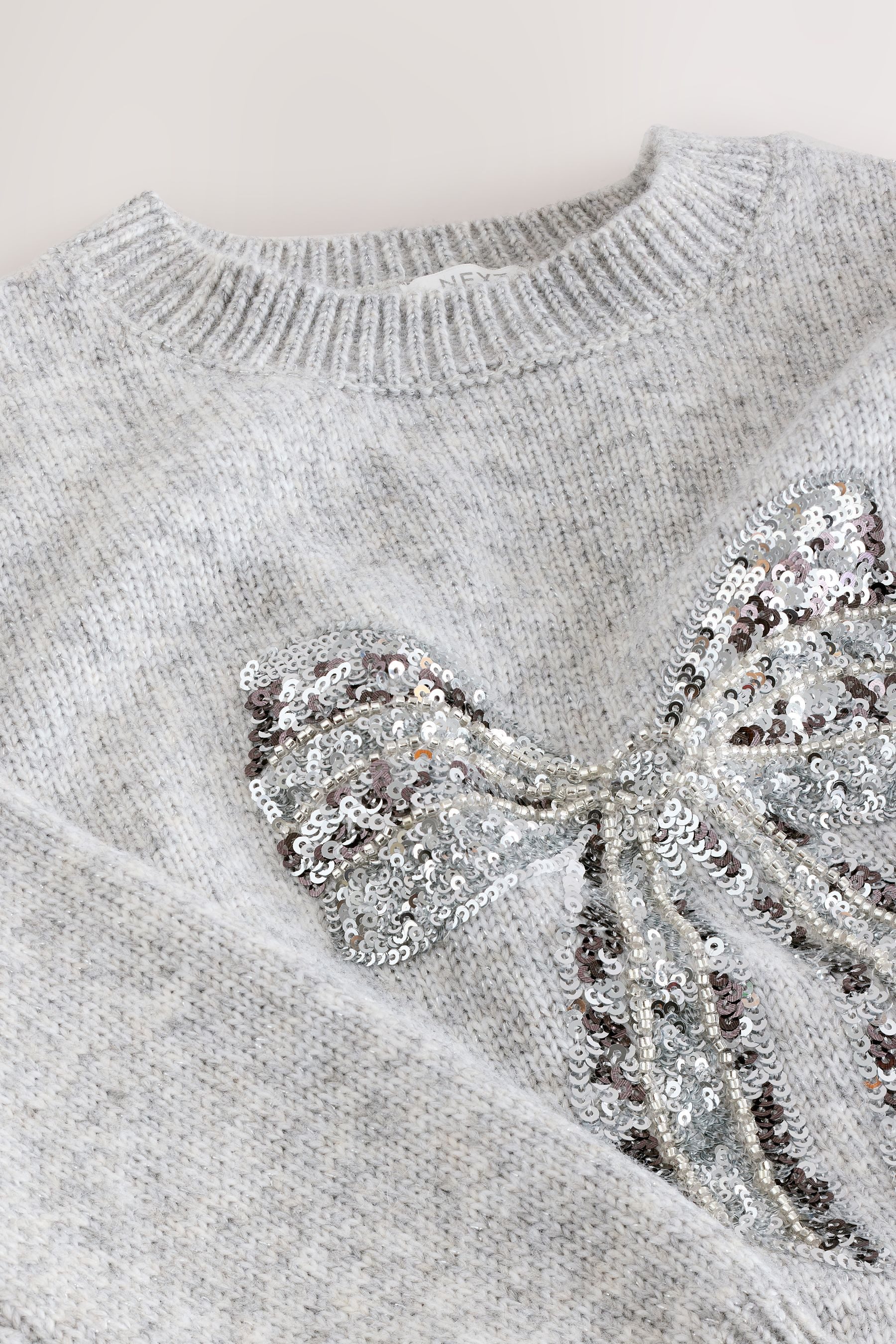 Next Strickpullover Pullover mit Paillettenschleife (1-tlg)