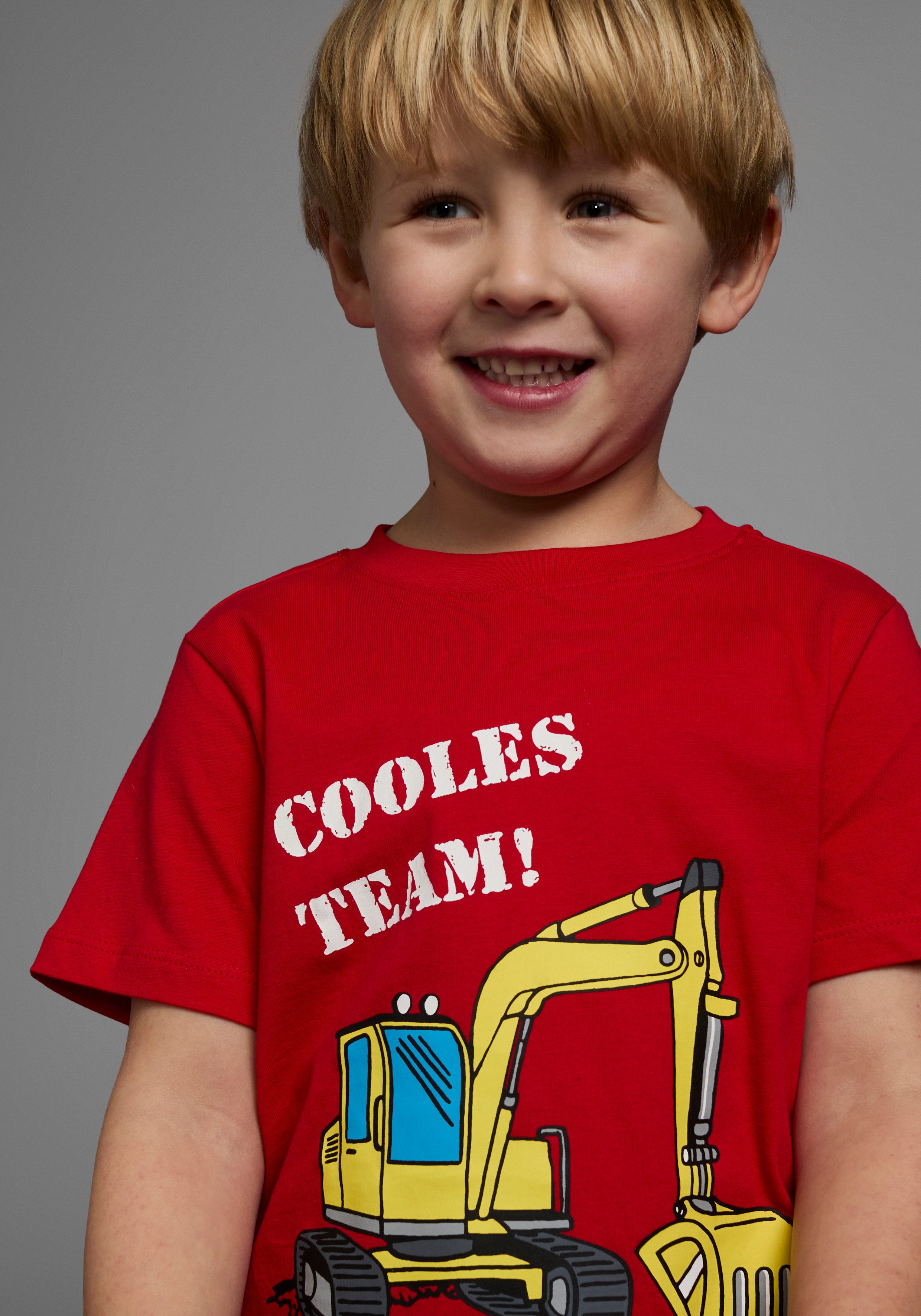 KIDSWORLD T-Shirt Mit Bagger-Druck Kurzarm, mit peppigem Druck, mit Rippbündchen am Ausschnitt