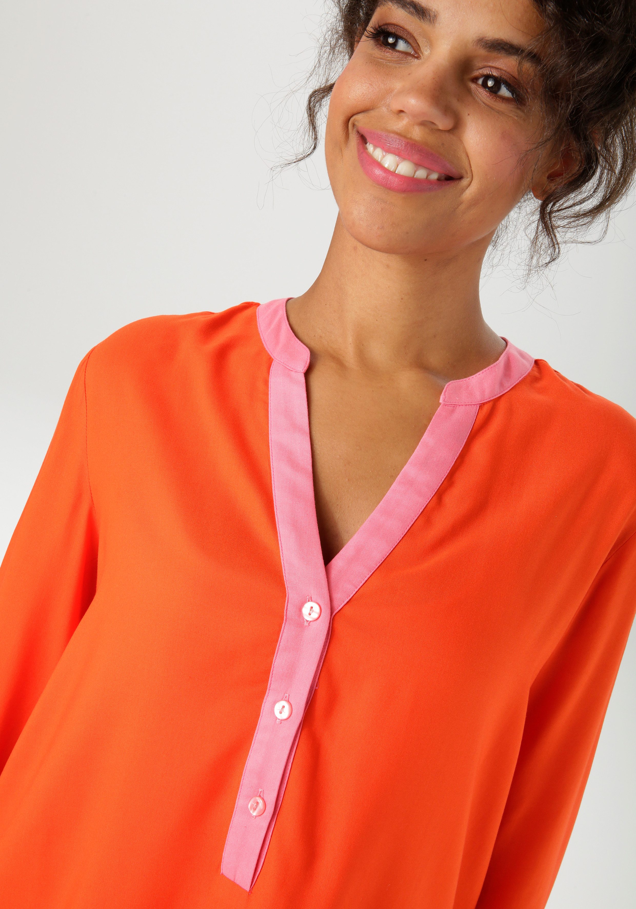 Aniston CASUAL Schlupfbluse mit pinkfarbenen Akzenten