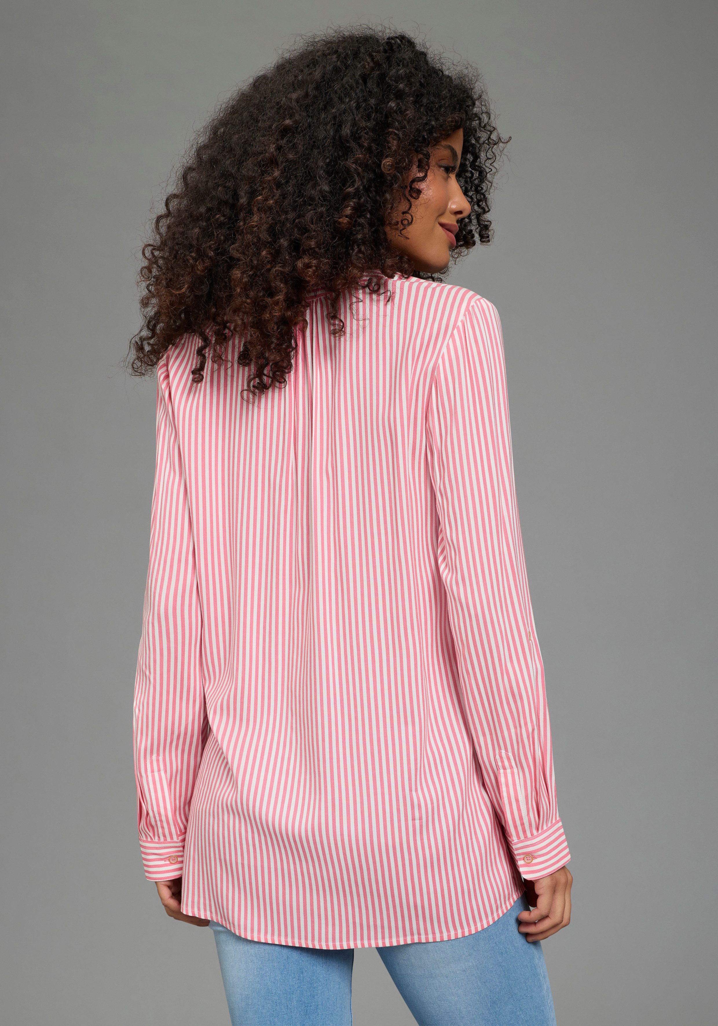 KangaROOS Schlupfbluse Langarmbluse, figurumspielende Passform, Rundhalsaus günstig online kaufen