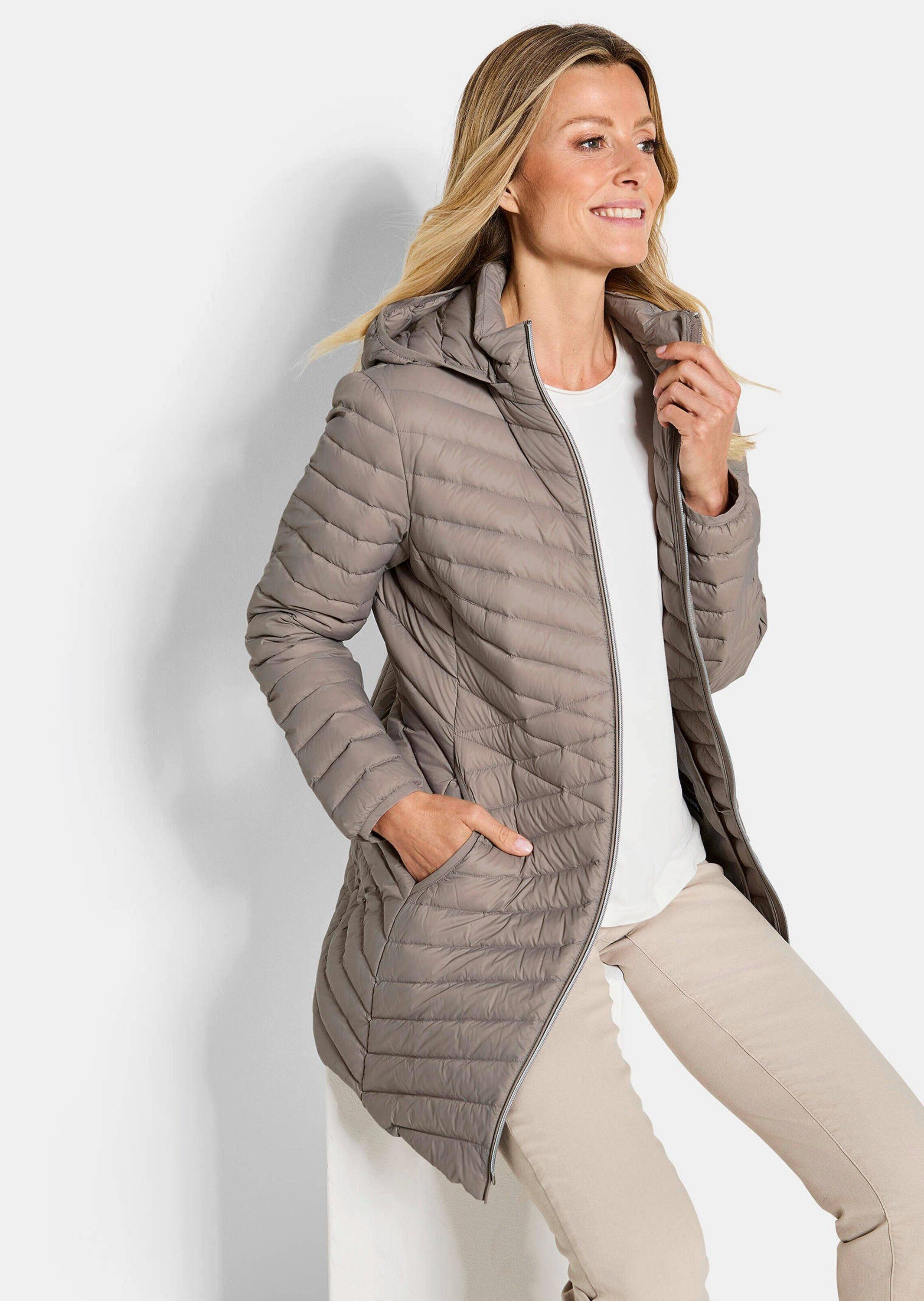 GOLDNER Winterjacke Gefütterter langer Mantel mit Kapuze Wintermantel in femininer Steppung mit Stehkragen und Taschen