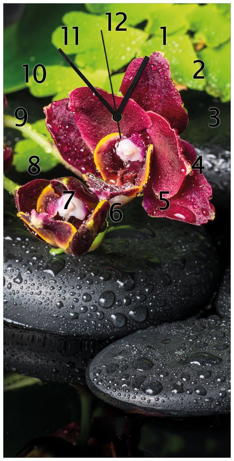 Wallario Steinen auf mit Wanduhr schwarzen Acryl) aus Orchideen-Blüte Dunkelrote Regentropfen (Uhr