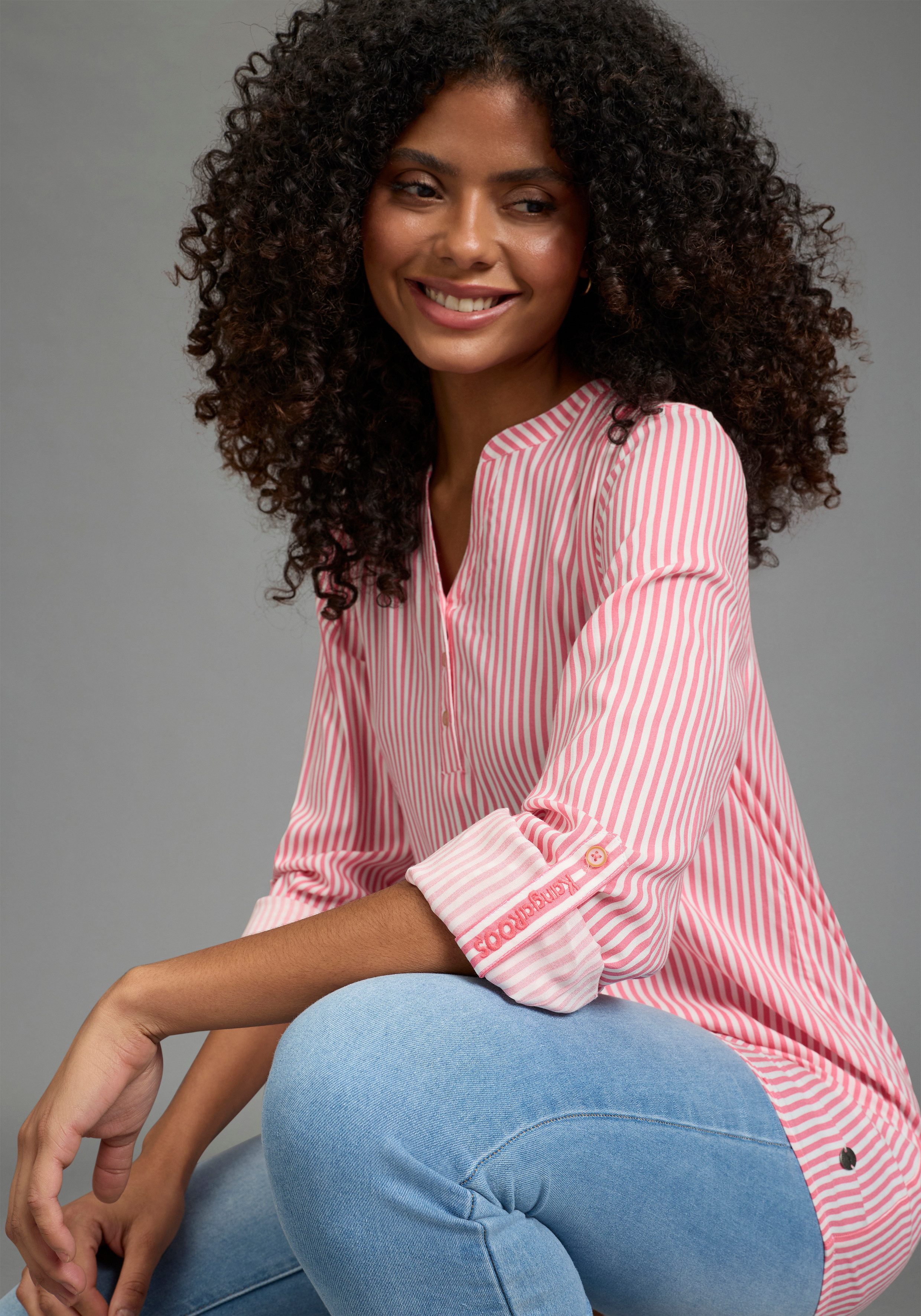 KangaROOS Schlupfbluse Langarmbluse, figurumspielende Passform, Rundhalsausschnitt. € 42,99, (€ 42,99 pro 1 Stk).