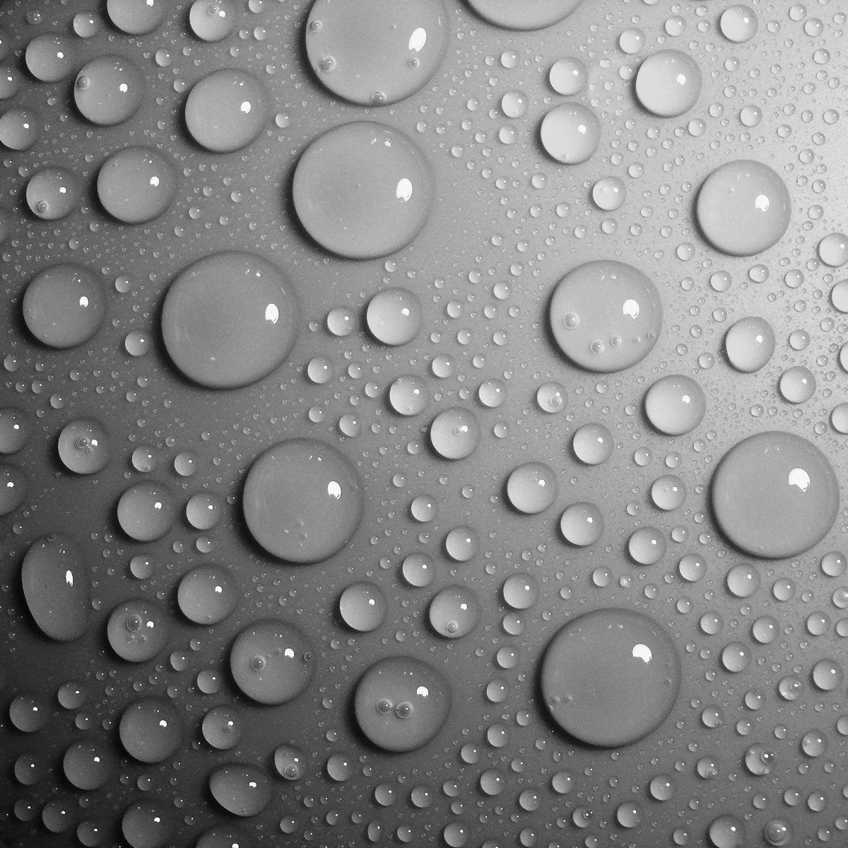 Wallario Möbelfolie Wassertropfen in schwarz weiß