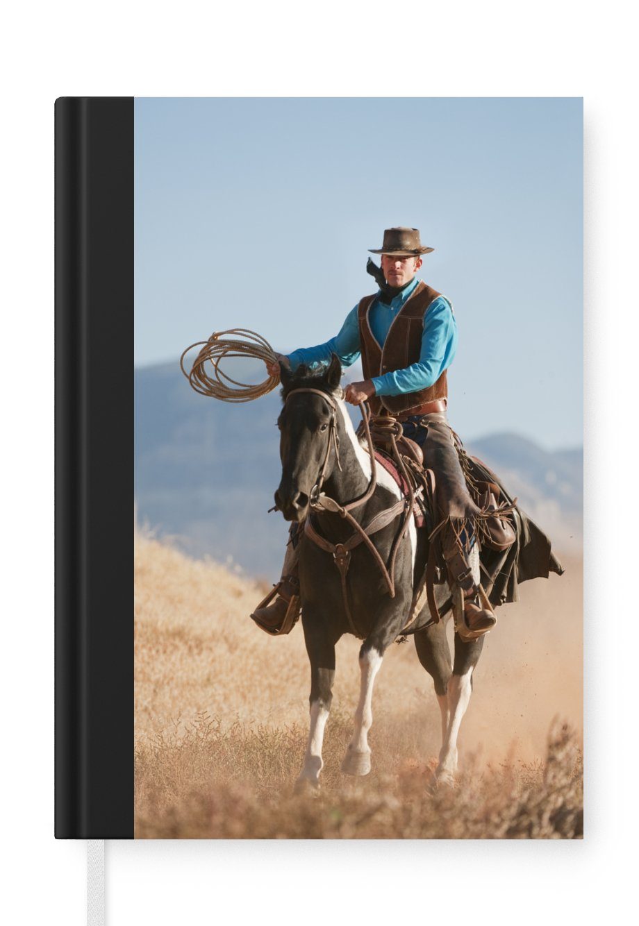 MuchoWow Notizbuch Ein Cowboy auf einem Pferd vor einem grauen Himmel, Journal, Merkzettel, Tagebuch, Notizheft, A5, 98 Seiten, Haushaltsbuch