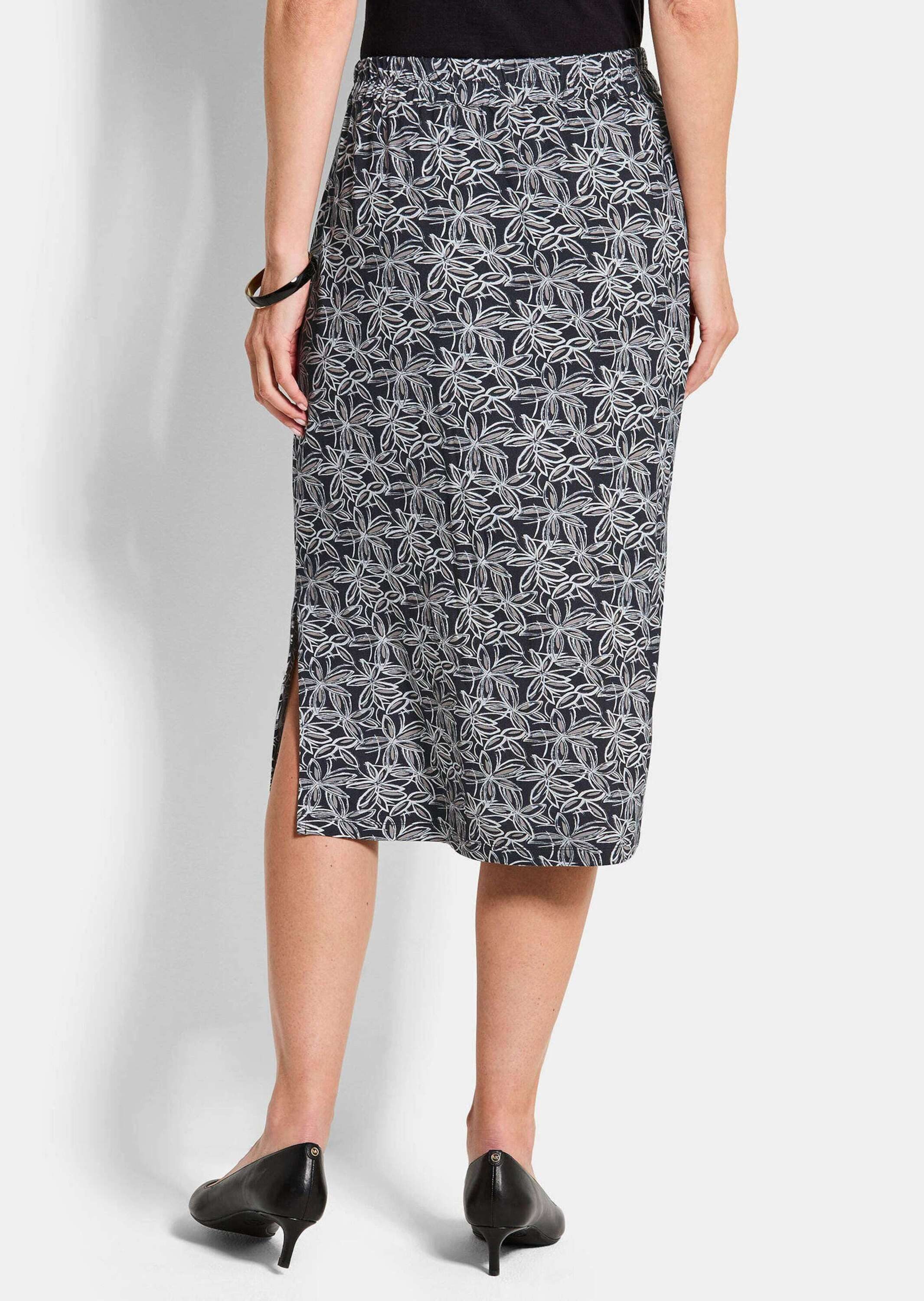 GOLDNER Jerseyrock Kurzgröße: Schlupfrock mit floralem Muster Midirock mit Rundum-Dehnbund, seitlichem Schlitz und Wadenlänge