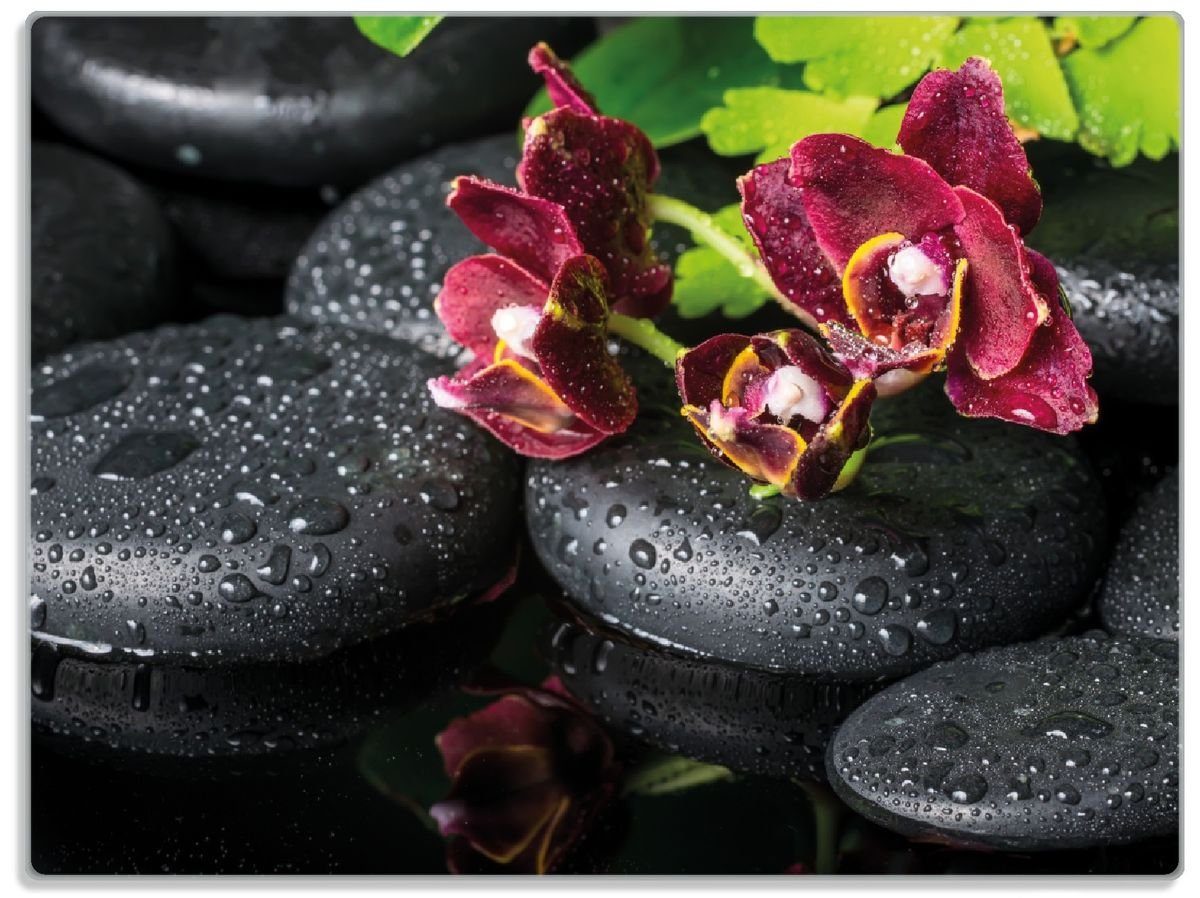 Wallario Schneidebrett Dunkelrote Orchideen-Blüte auf schwarzen Steinen mit Regentropfen, ESG-Sicherheitsglas, (inkl. rutschfester Gummifüße 4mm, 1-St), 30x40cm