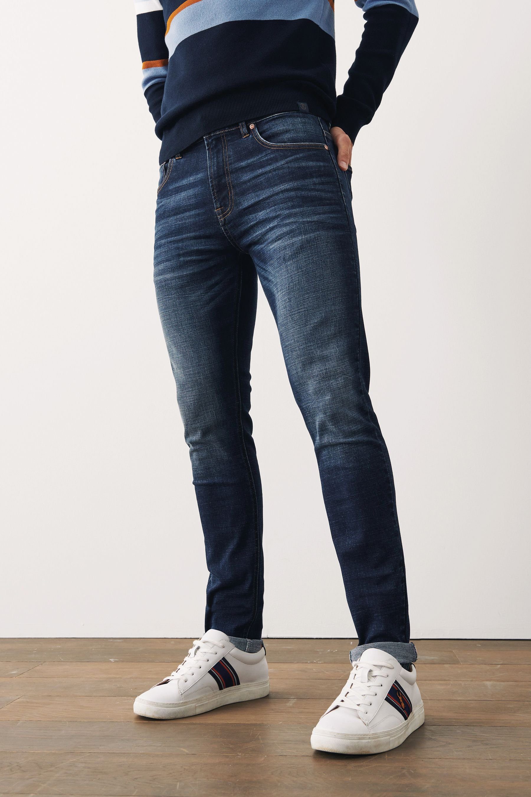 Next Slim-fit-Jeans Motionflex Jeans - Indigo Blue Slim Mid (1-tlg)