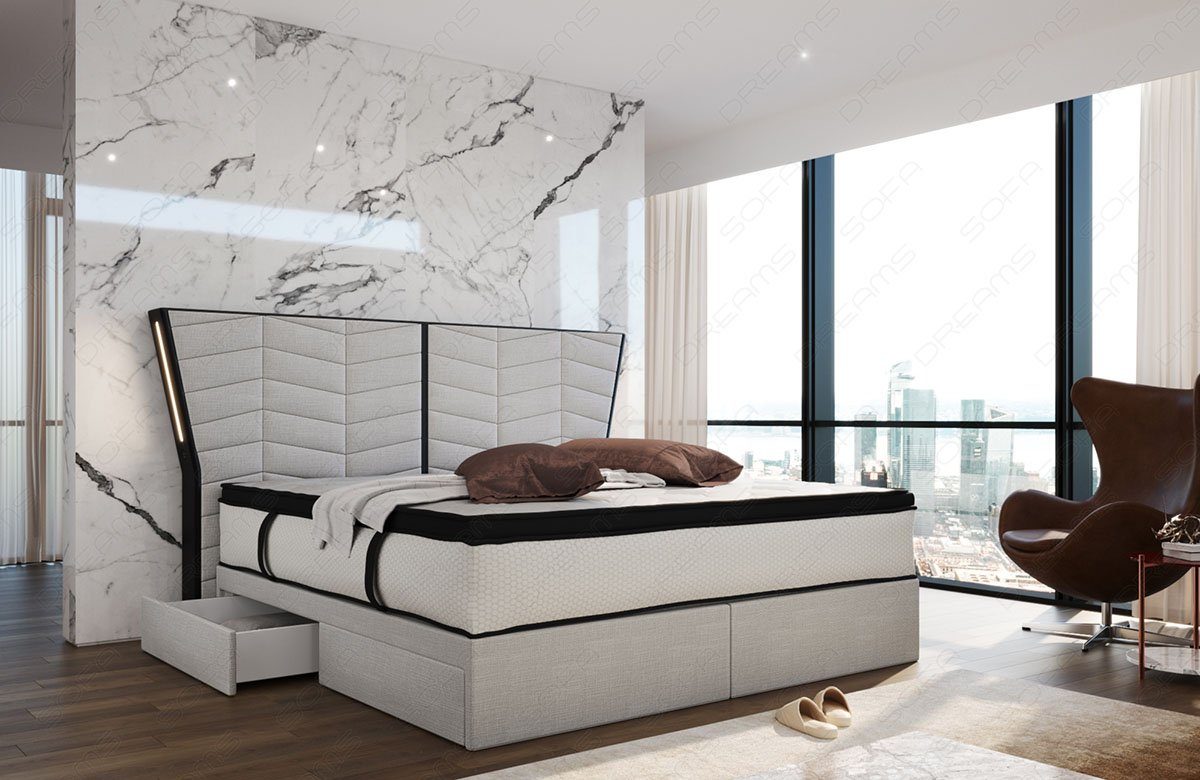 Sofa Dreams Boxspringbett Novara - Strukturstoff, mit Matratze, Topper, Schubladen, USB Anschlüsse, Beleuchtung, FB
