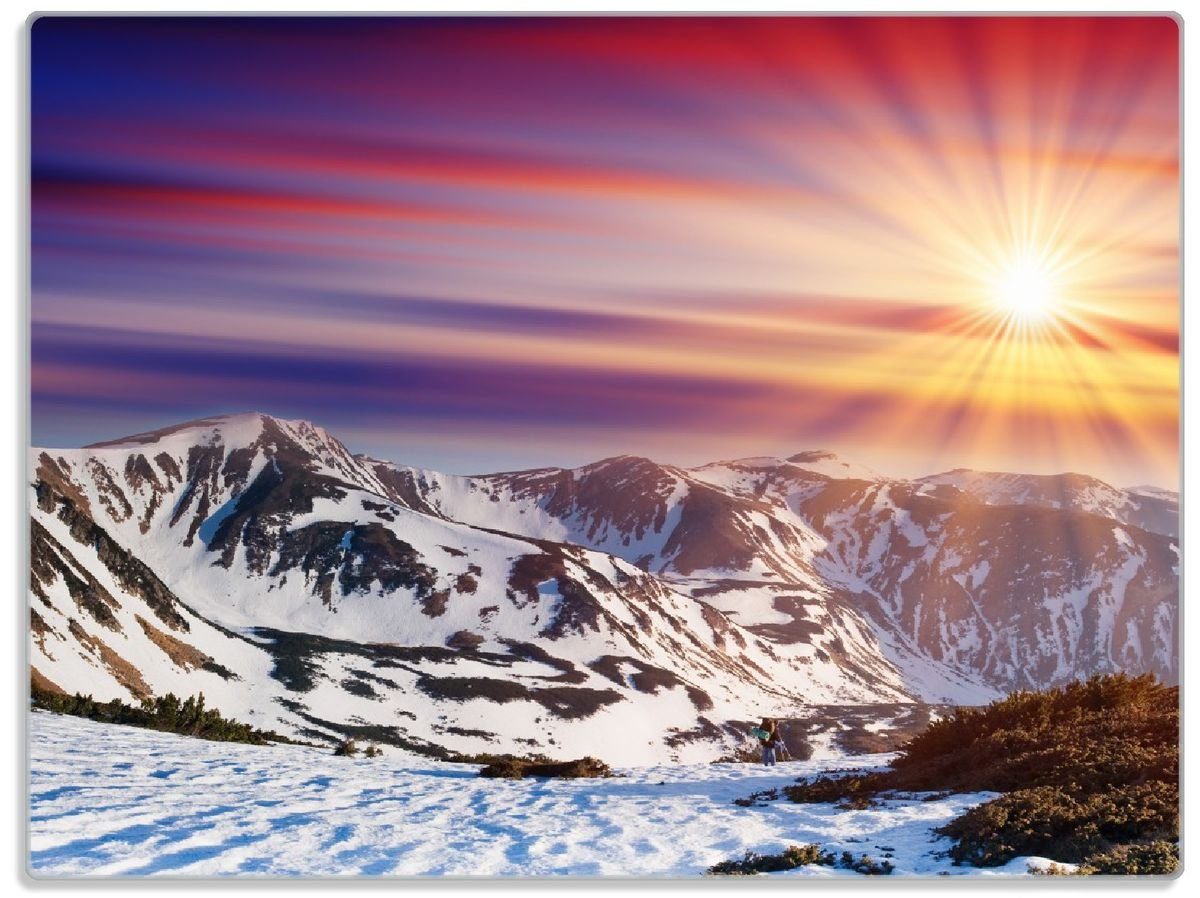 Wallario Schneidebrett Farbenfroher Sonnenuntergang im Winter - Schnee in den Bergen, ESG-Sicherheitsglas, (inkl. rutschfester Gummifüße 4mm, 1-St), 30x40cm