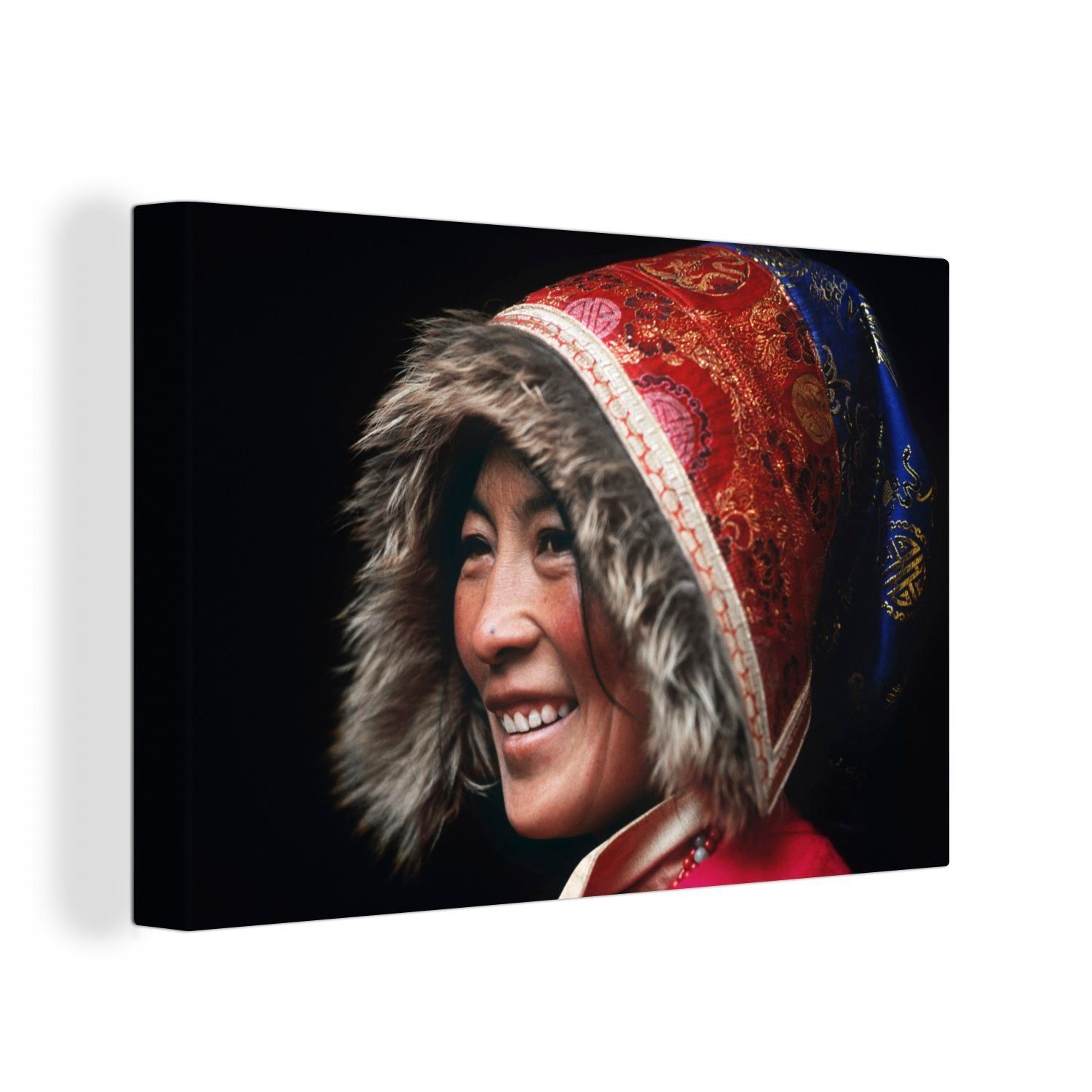 Leinwandbild in Wanddeko, St), Kleidung 30x20 tibetische (1 trägt Tibet, Person Wandbild Aufhängefertig, OneMillionCanvasses® cm traditionelle Eine Leinwandbilder,
