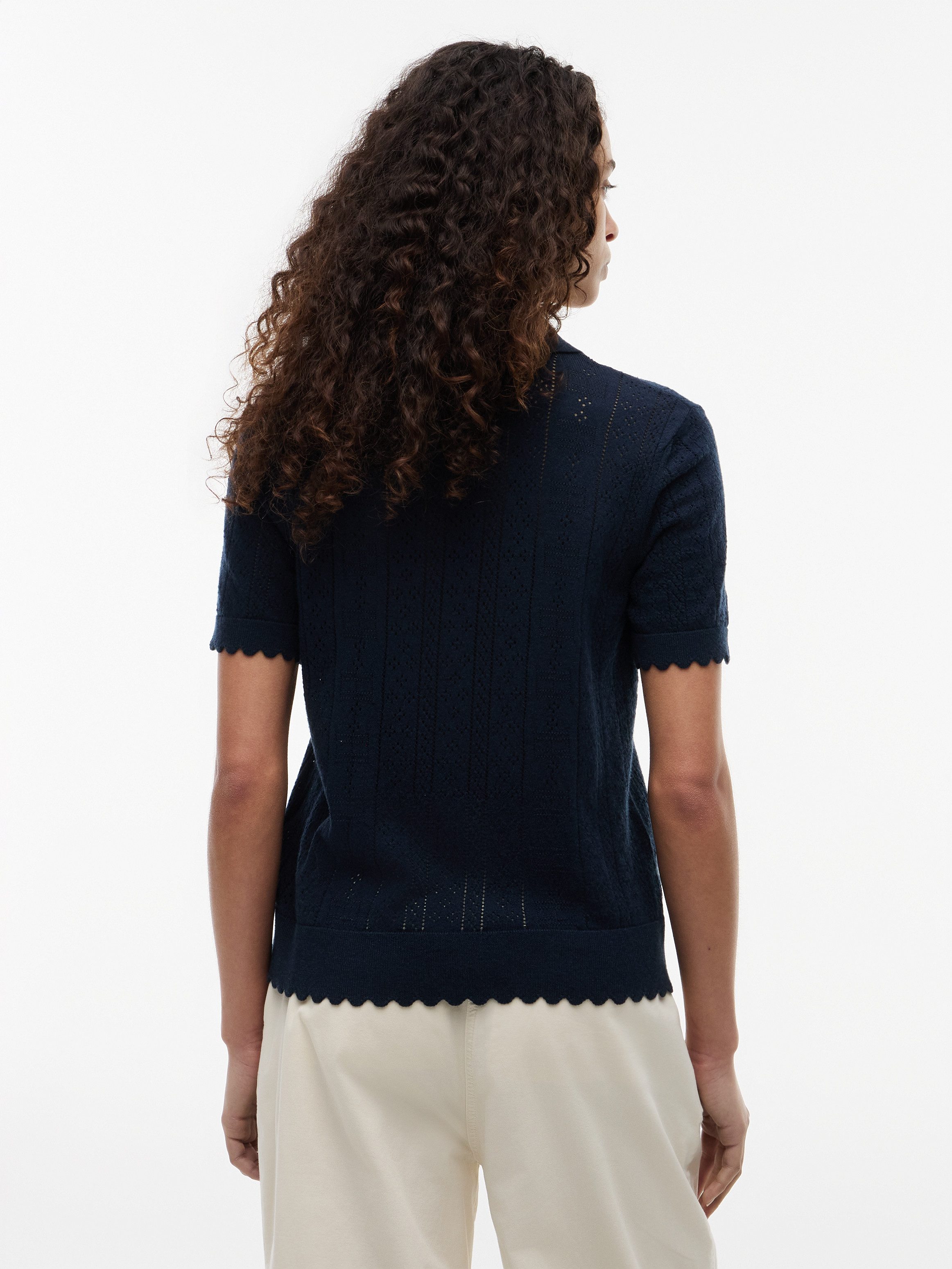 Tommy Jeans Kurzarmpullover TJW POINTELLE POLO SWEATER Viskosemischung, Pointelle Strickmuster, gewellte Säume