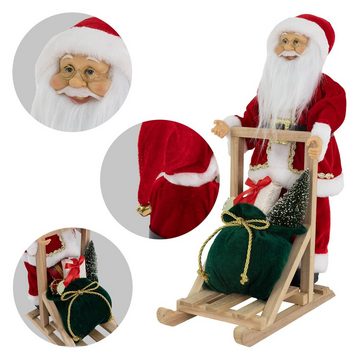 ECD Germany Weihnachtsmann Dekofigur Winterdekoration Santa Claus, Polyresin & Holz stehend auf Schlitten 30x20x50cm