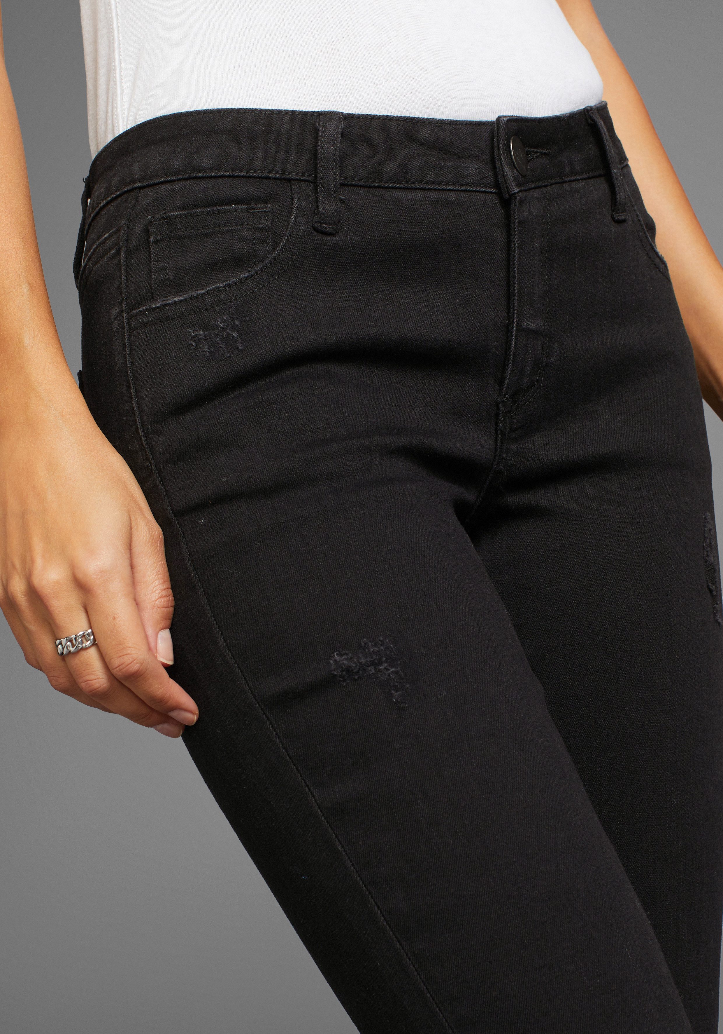 Arizona Bootcut-Jeans Ultra-Stretch ausgestellte Beinform, modischer Used-Look, normale Leibhöhe