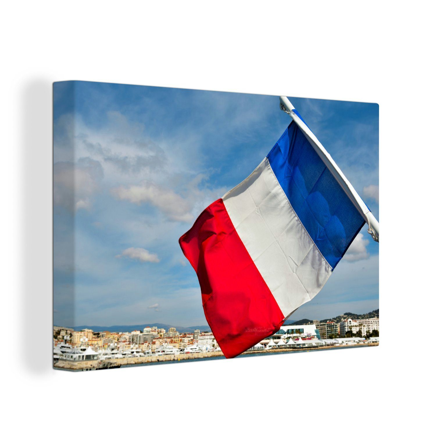 OneMillionCanvasses® Leinwandbild Französische Flagge mit Blick auf Cannes, (1 St), Wandbild Leinwandbilder, Aufhängefertig, Wanddeko, 30x20 cm