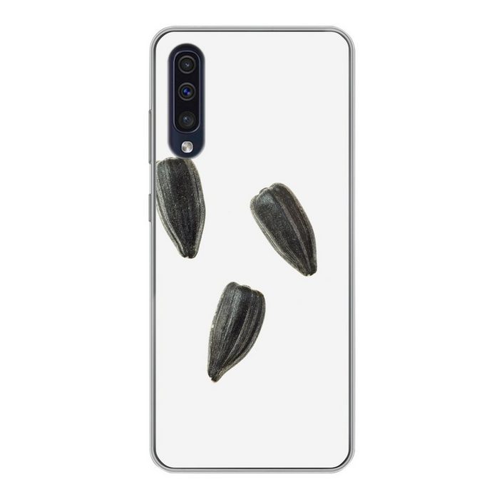 MuchoWow Handyhülle Schwarze Sonnenblumenkerne auf weißem Hintergrund Handyhülle Samsung Galaxy A30s Smartphone-Bumper Print Handy