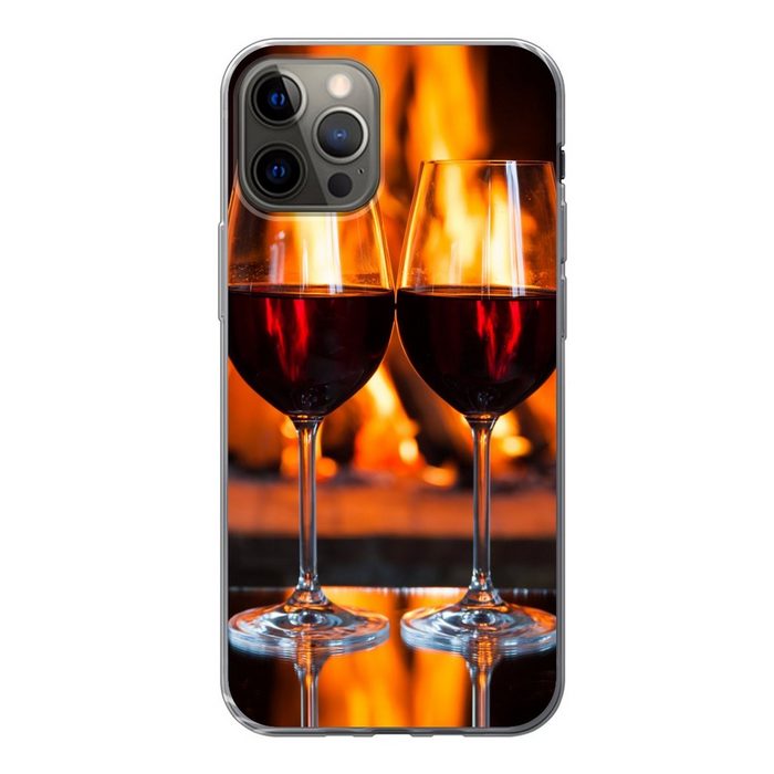 MuchoWow Handyhülle Zwei Gläser Rotwein am offenen Feuer Handyhülle Apple iPhone 12 Pro Smartphone-Bumper Print Handy