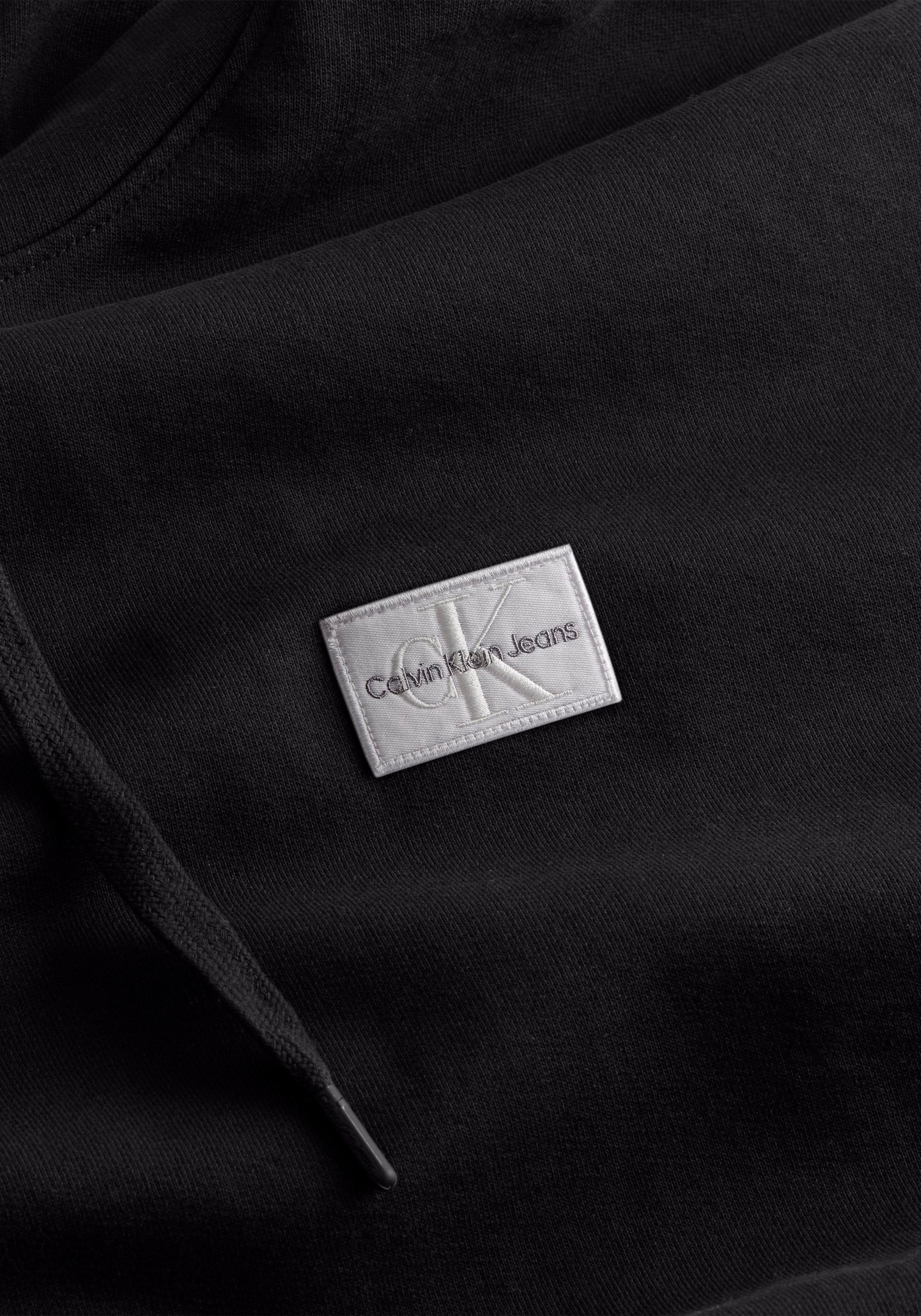 schwarz Brust der Jeans Klein mit Calvin auf Logo-Badge Kapuzensweatshirt Klein Calvin