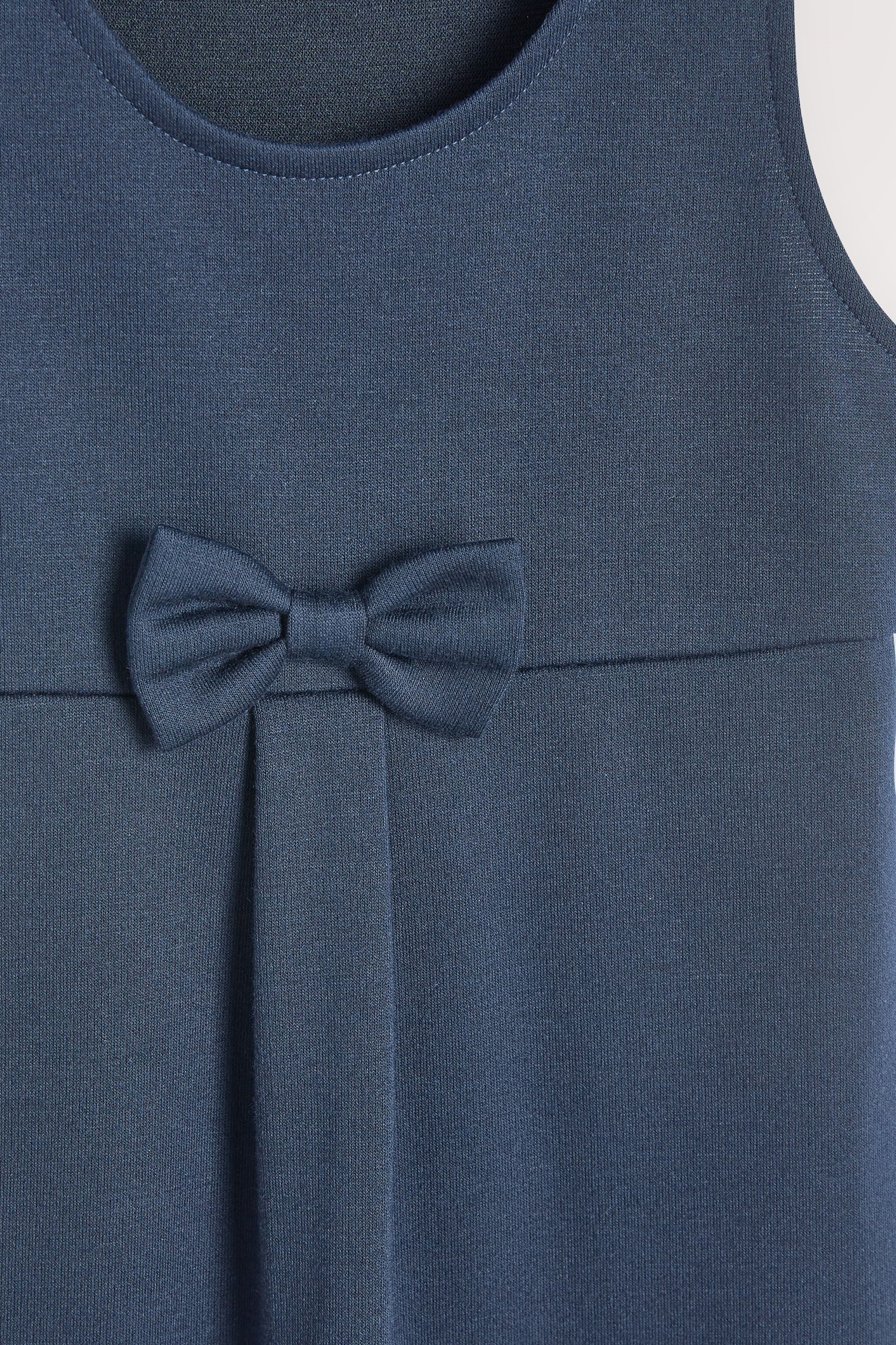 Next Latzkleid Schul-Latzkleid aus Jersey mit Zierschleife (1-tlg)
