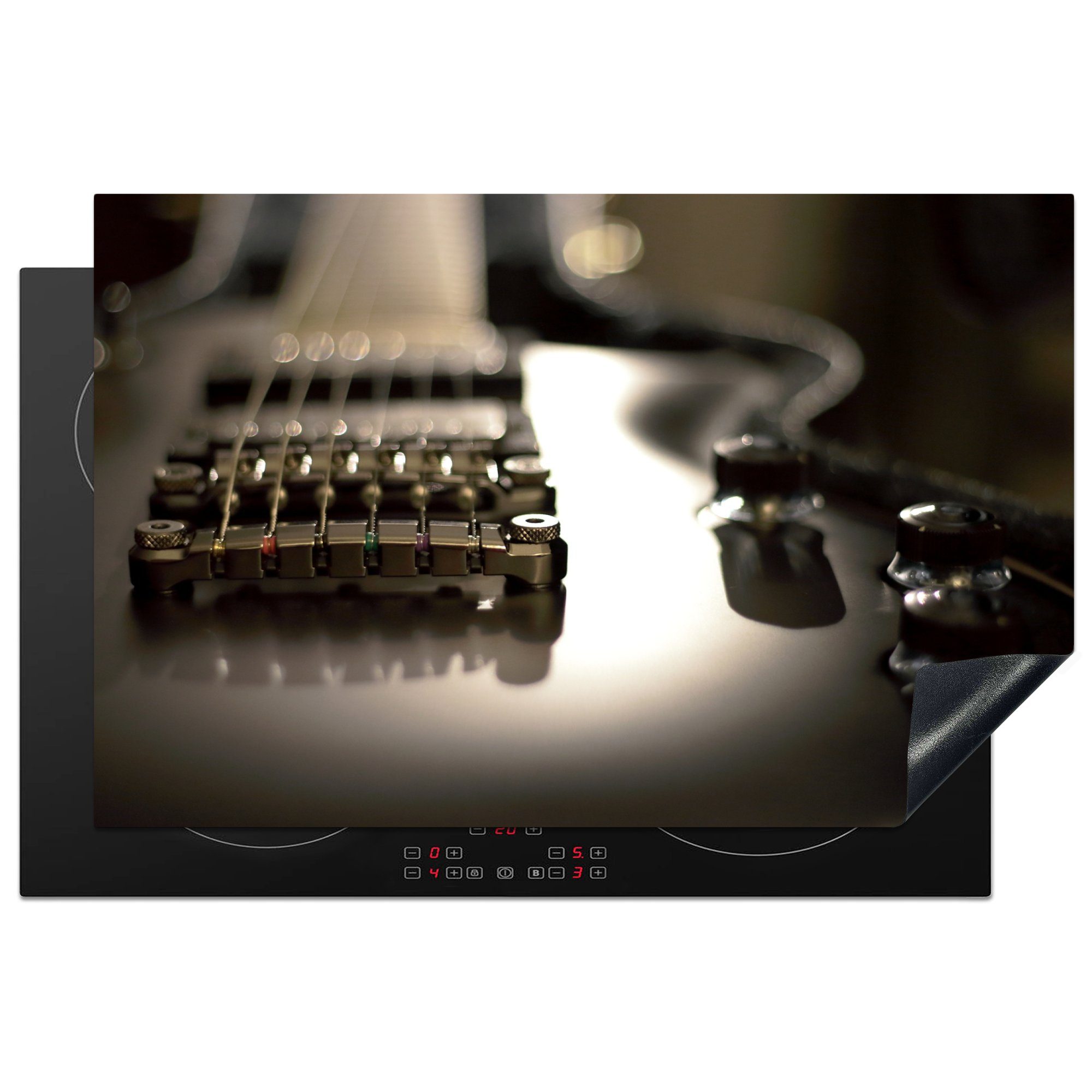 MuchoWow Herdblende-/Abdeckplatte Nahaufnahme einer schwarzen E-Gitarre, Vinyl, (1 tlg), 81x52 cm, Induktionskochfeld Schutz für die küche, Ceranfeldabdeckung