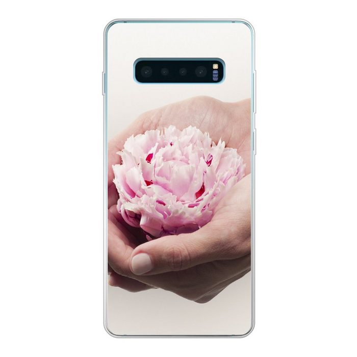MuchoWow Handyhülle Die Hände halten eine rosa Pfingstrose Phone Case Handyhülle Samsung Galaxy S10 Lite Silikon Schutzhülle