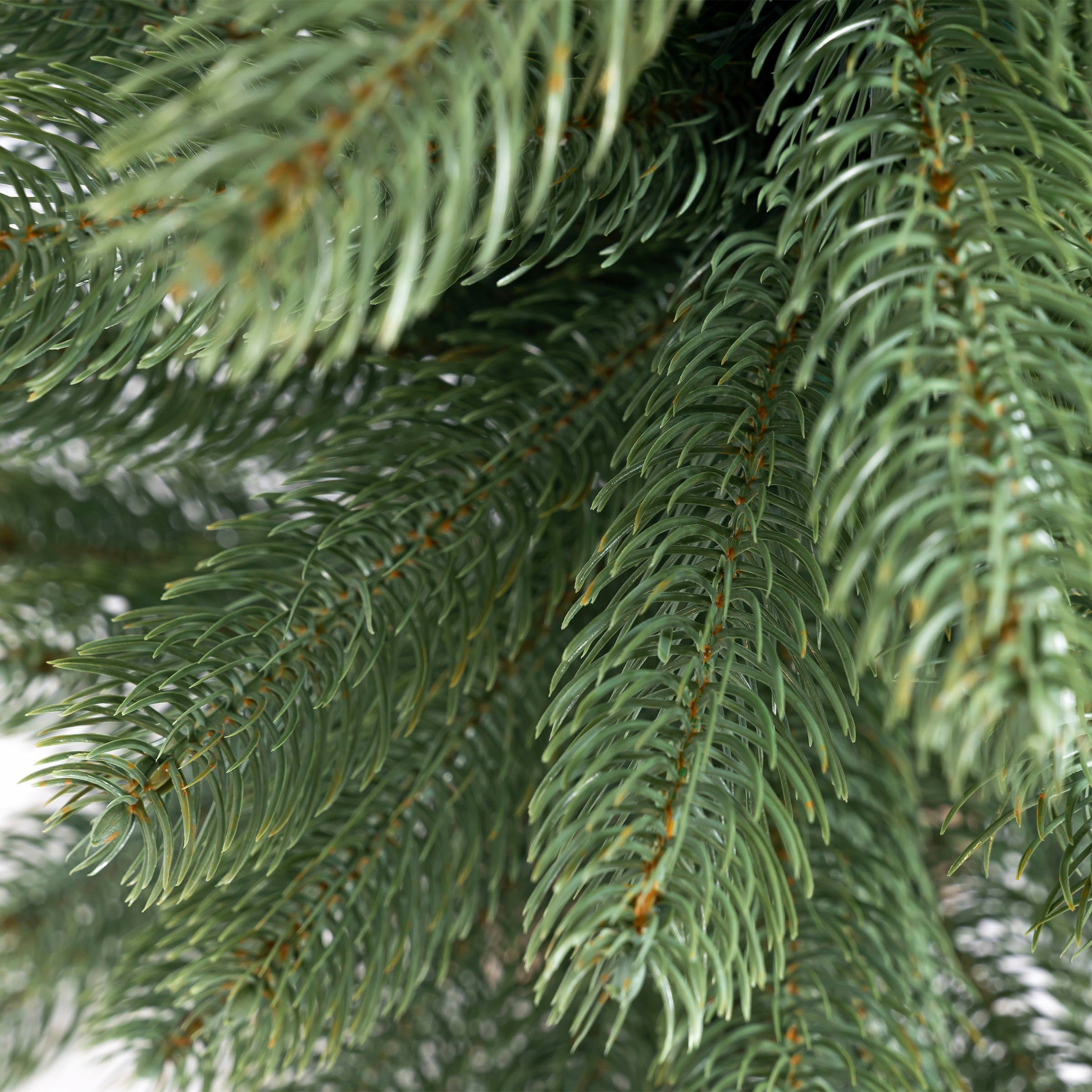 IC Winterworld Künstlicher Weihnachtsbaum Tannenbaum, künstlicher Christbaum, Nordmanntanne, Weihnachtsdeko mit Jutebeutel um den Betonfuß – Bild 3 von 5
