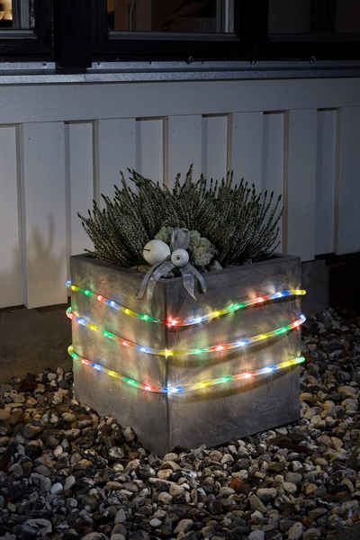KONSTSMIDE LED-Lichterschlauch Weihnachtsdeko aussen, 96-flammig, 6 m, mit Lichtsensor und 6h und 9h Timer, 96 bunte Dioden