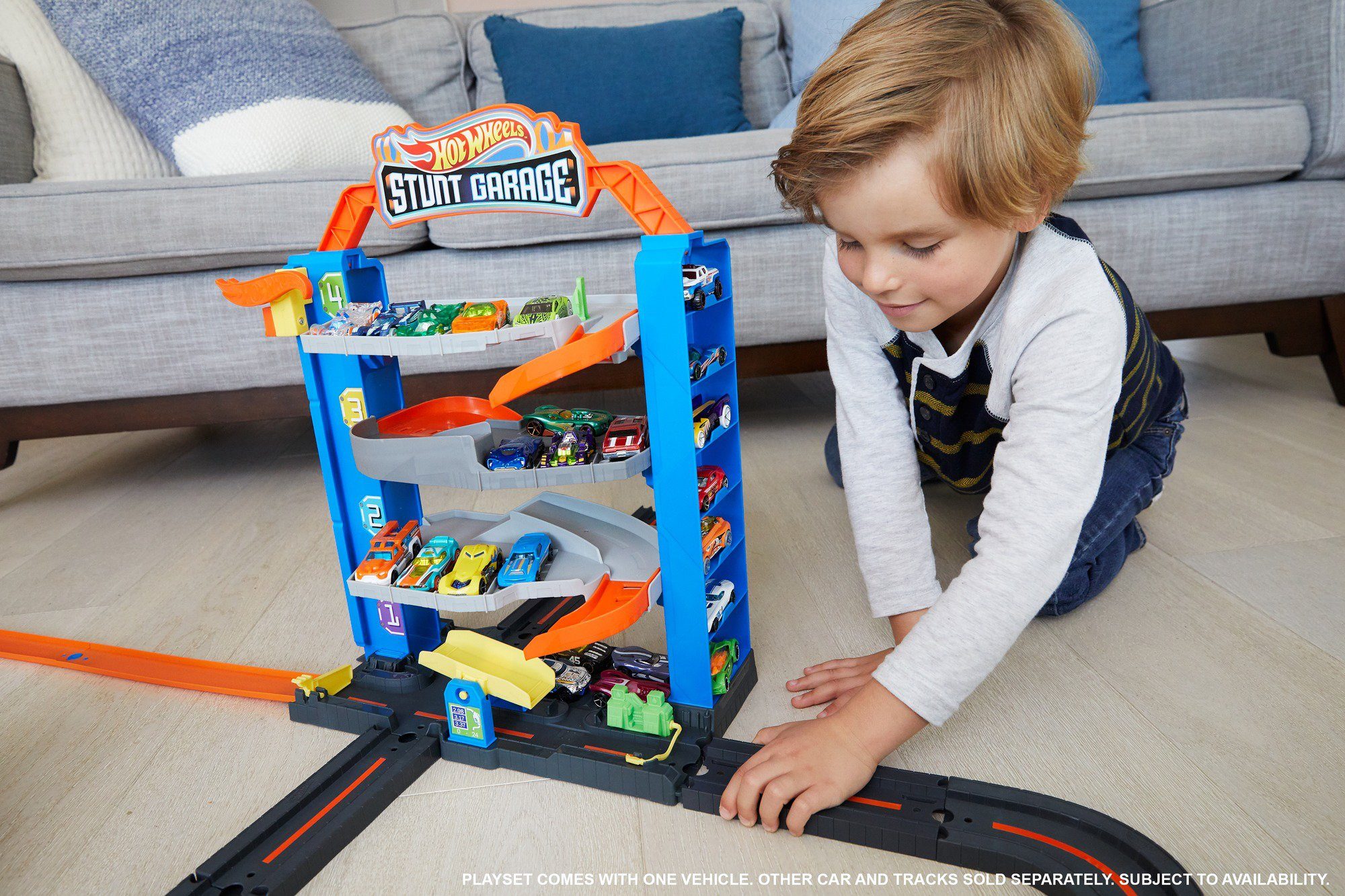 Mattel® Hot Wheels Spiel-Parkgarage Stunt-Garage Spielzeugauto Parkhaus, inklusive 1 Spielset