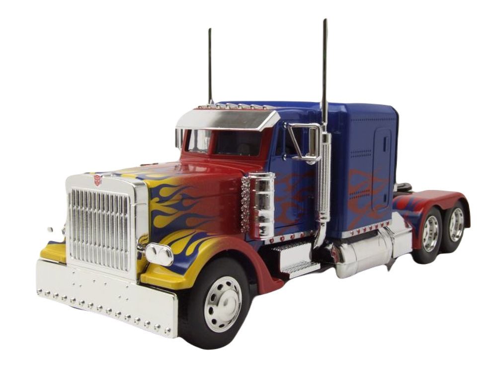 JADA Modellauto Peterbilt 379 Optimus Prime Transformers 1 blau mit Flammen, Maßstab 1:32