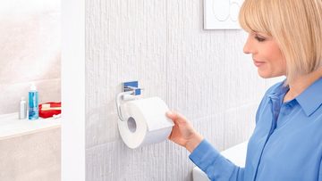 tesa Toilettenpapierhalter DELUXXE WC-Rollenhalter ohne Bohren - 10,1 cm : 16,0 cm : 4,5 cm (Packung, 1-St., inkl. Klebelösung), selbstklebender WC-Rollenhalter - chrom - silber glänzend
