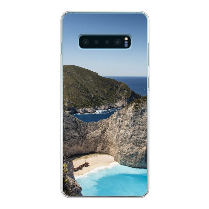 MuchoWow Handyhülle Die griechische Flagge weht über dem Strand von Navagio in Phone Case Handyhülle Samsung Galaxy S10 Lite Silikon Schutzhülle
