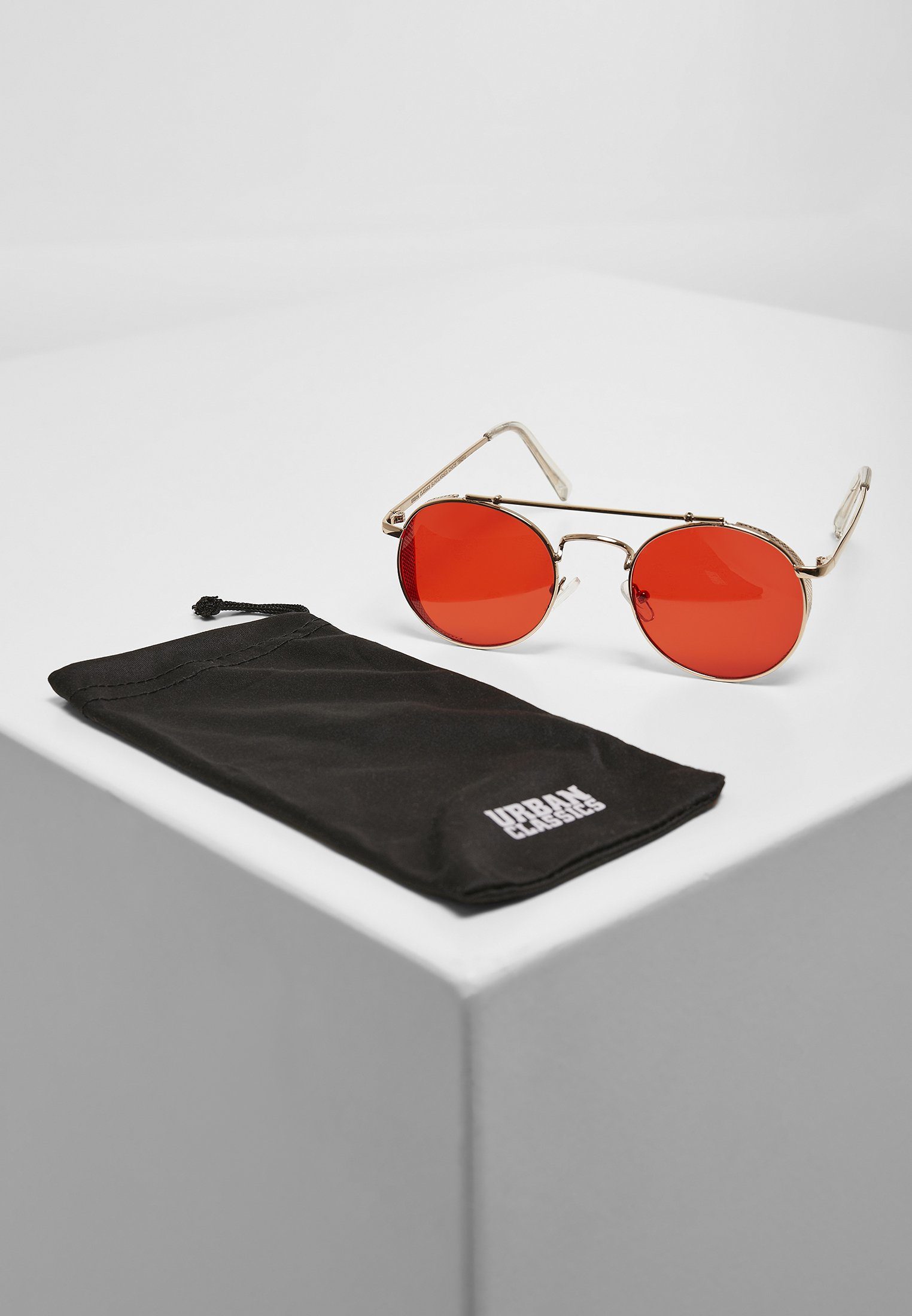 URBAN CLASSICS Sonnenbrille Unisex Sunglasses Chios gold/red | Sonnenbrillen