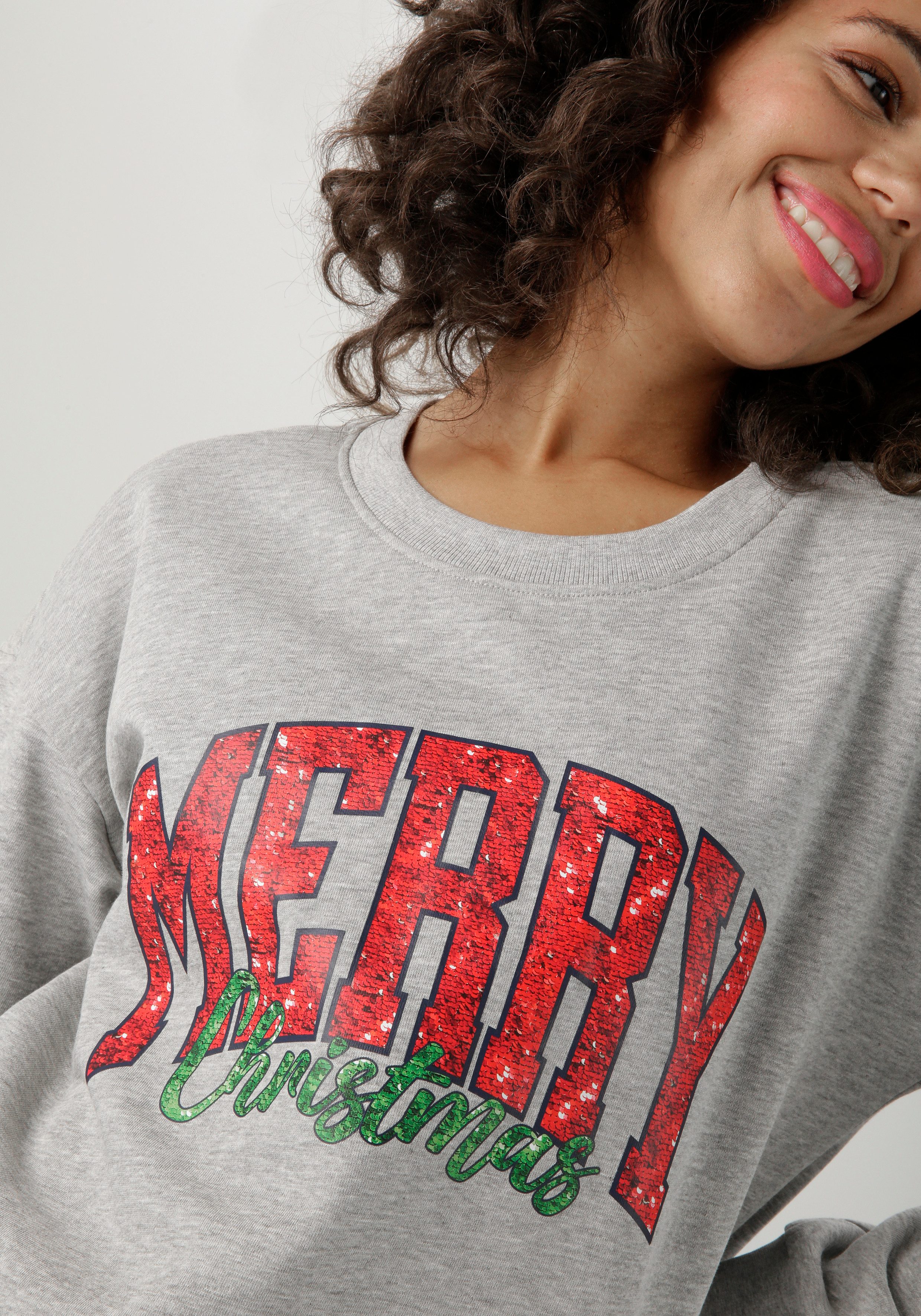 Aniston CASUAL Weihnachtssweatshirt mit "MERRY Christmas"-Schriftzug in Pailletten-Optik