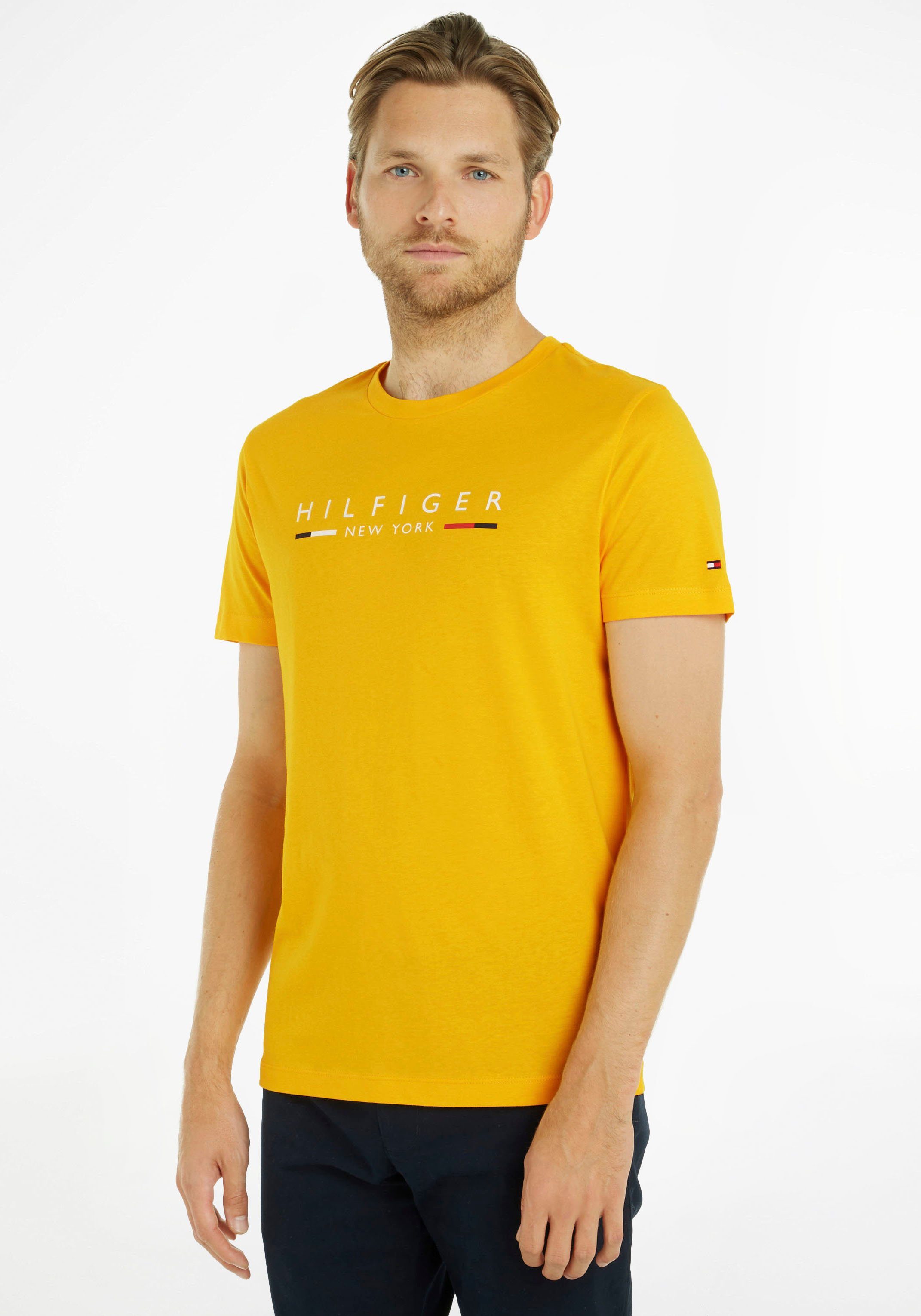 Tommy Hilfiger T-Shirt HILFIGER NEW YORK TEE mit Logoschriftzug auf der Brust gelb