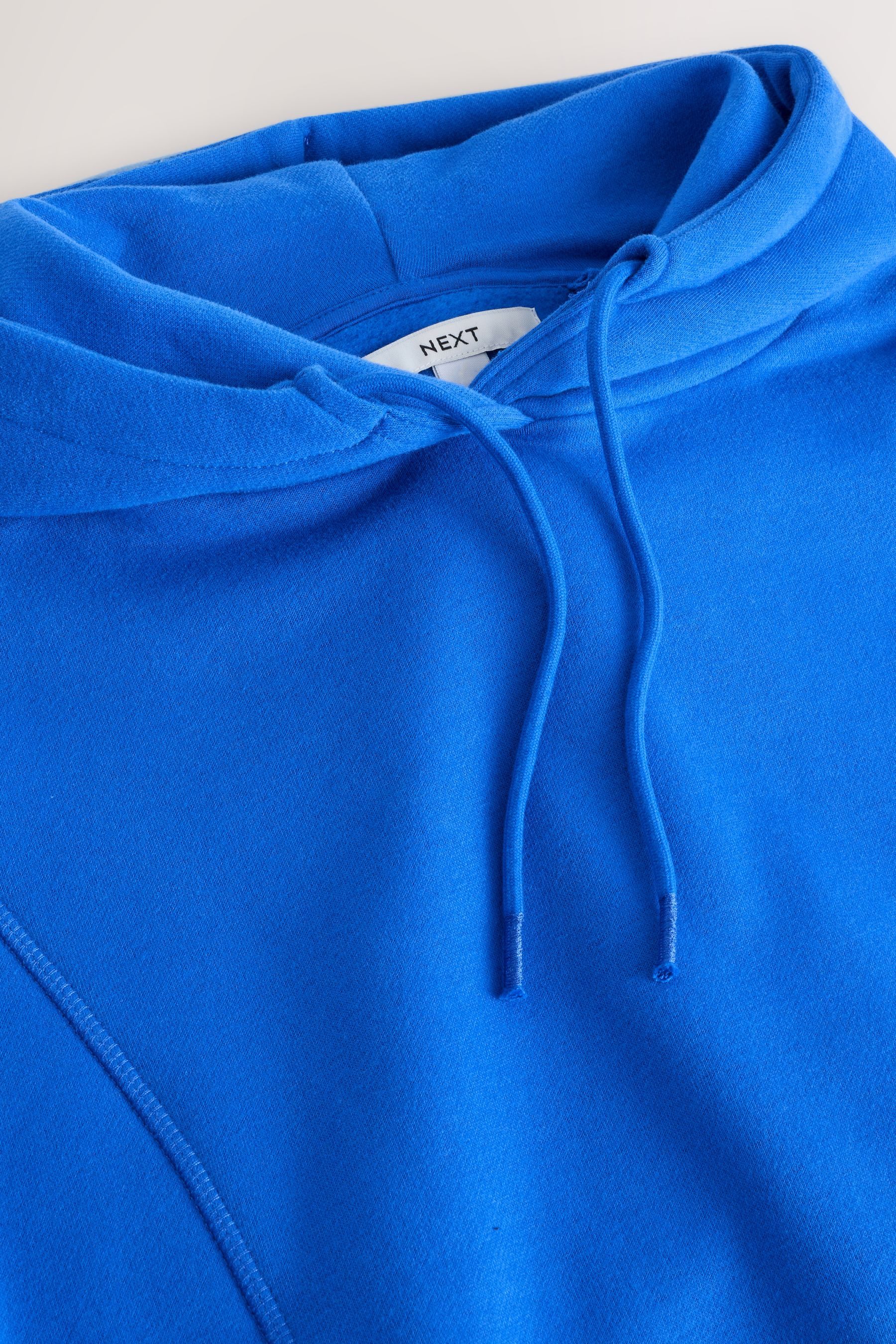 Next Kapuzenpullover Längeres Active Hoodie mit Taschen und Saumdetail (1-tlg)