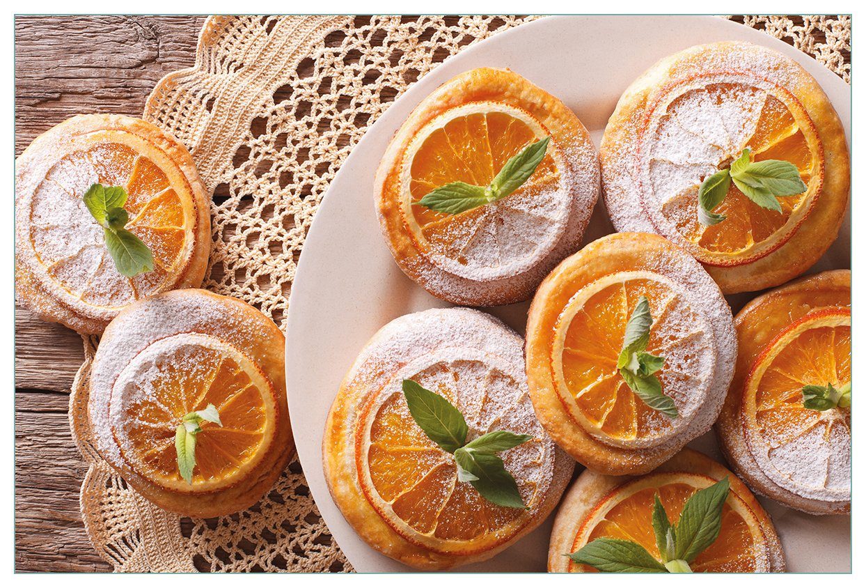 Wallario Küchenrückwand Frische Biskuits mit Orangenscheiben, (1-tlg)