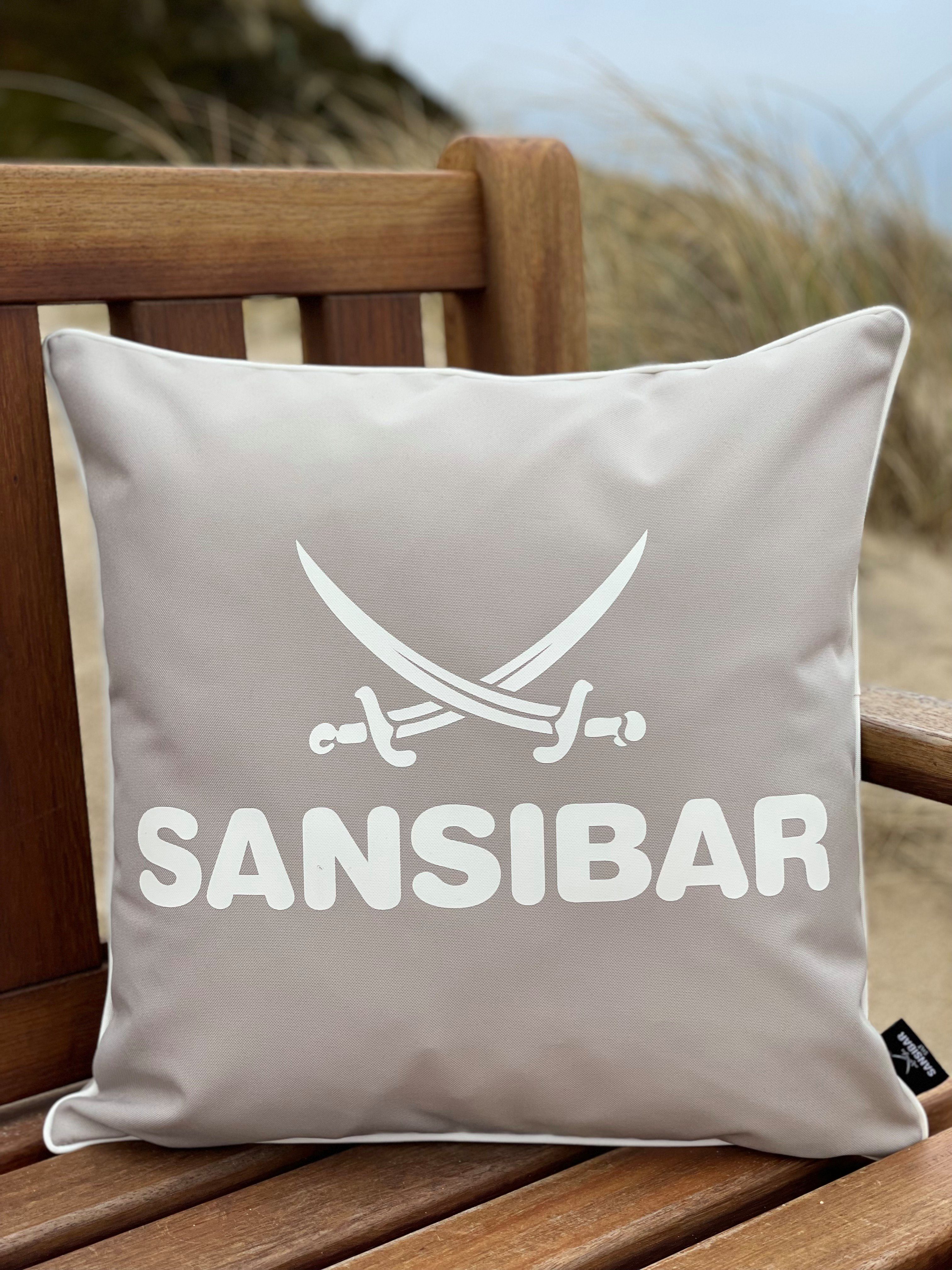 SANSIBAR Living Sansibar Sylt Dekokissen Outdoor Kissen Sansibar (1 Stück), Logodruck, 45x45 cm, Kissenfüllung, Outdoor geeignet, wasser- und schmutzabweisend taupe/offwhite