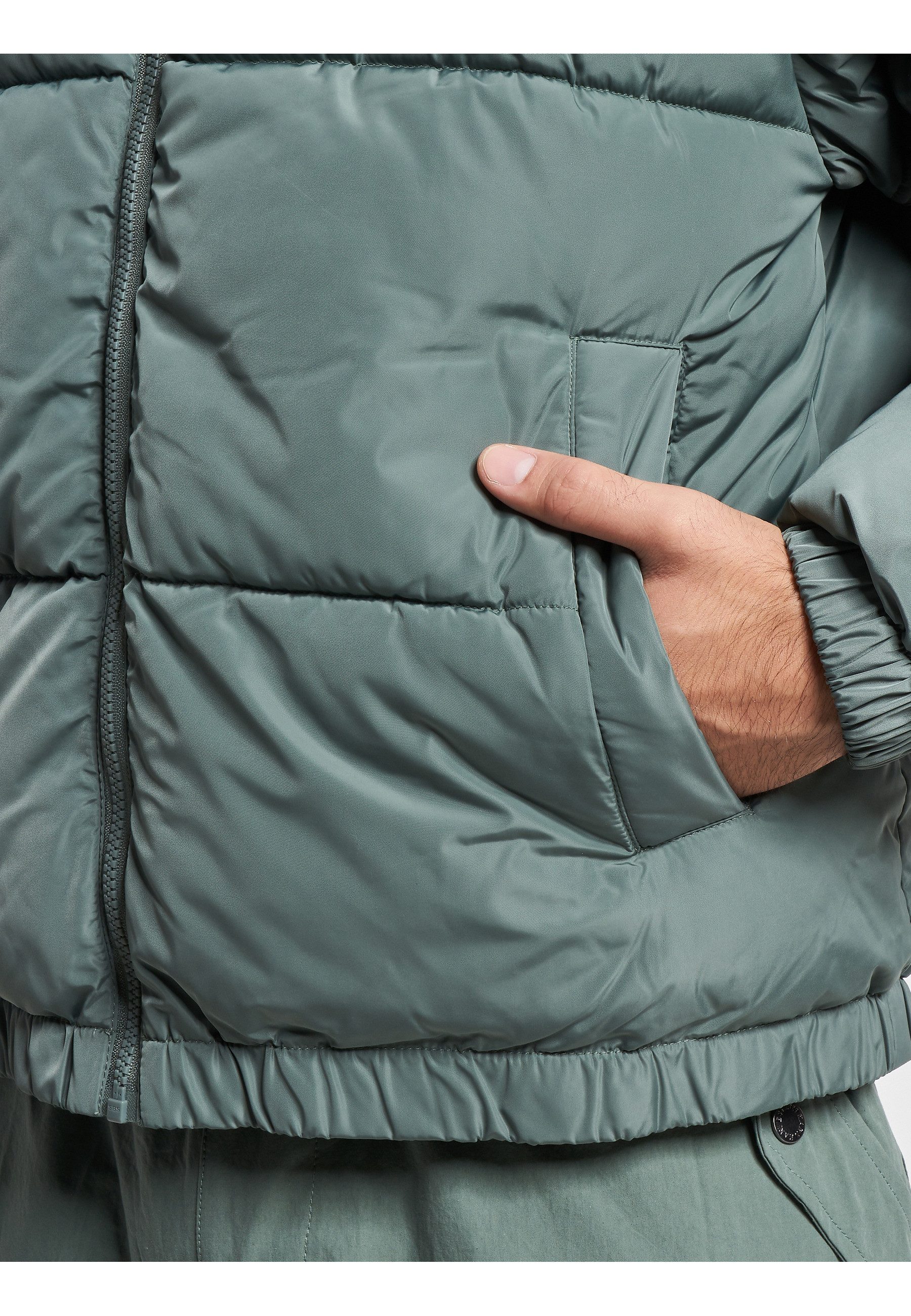 Karl Kani Winterjacke Karl Kani Herren KM233-052-1 KK Chest Signature Puffer Jacket (1-St)