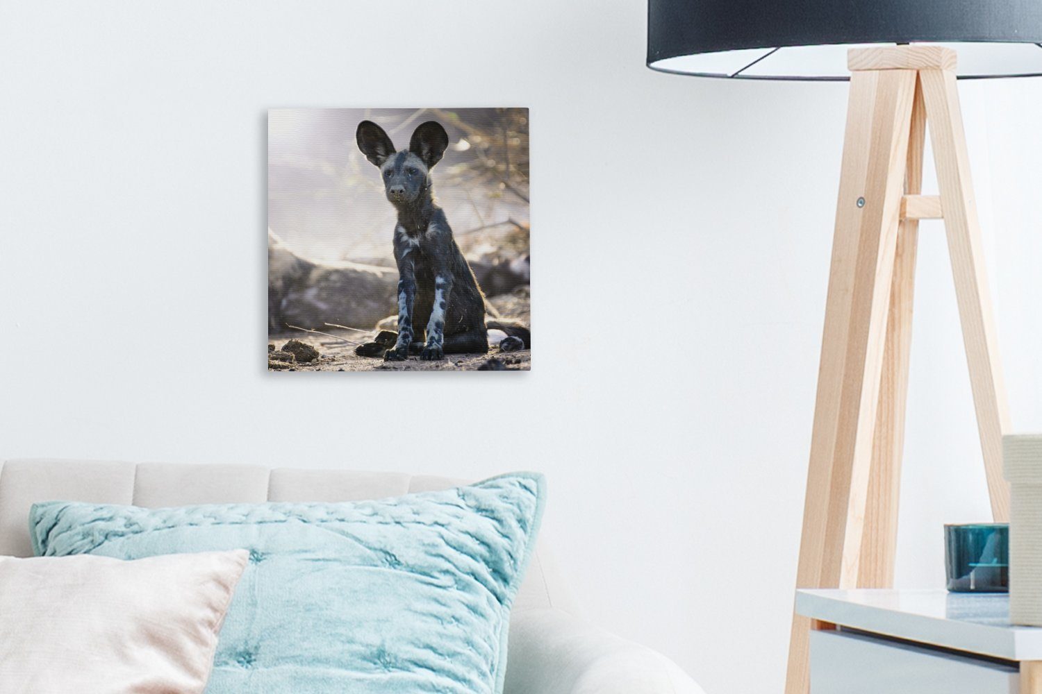 OneMillionCanvasses® Leinwandbild Sitzender Bilder Afrikanischer (1 Leinwand Schlafzimmer Wildhund, St), für Wohnzimmer