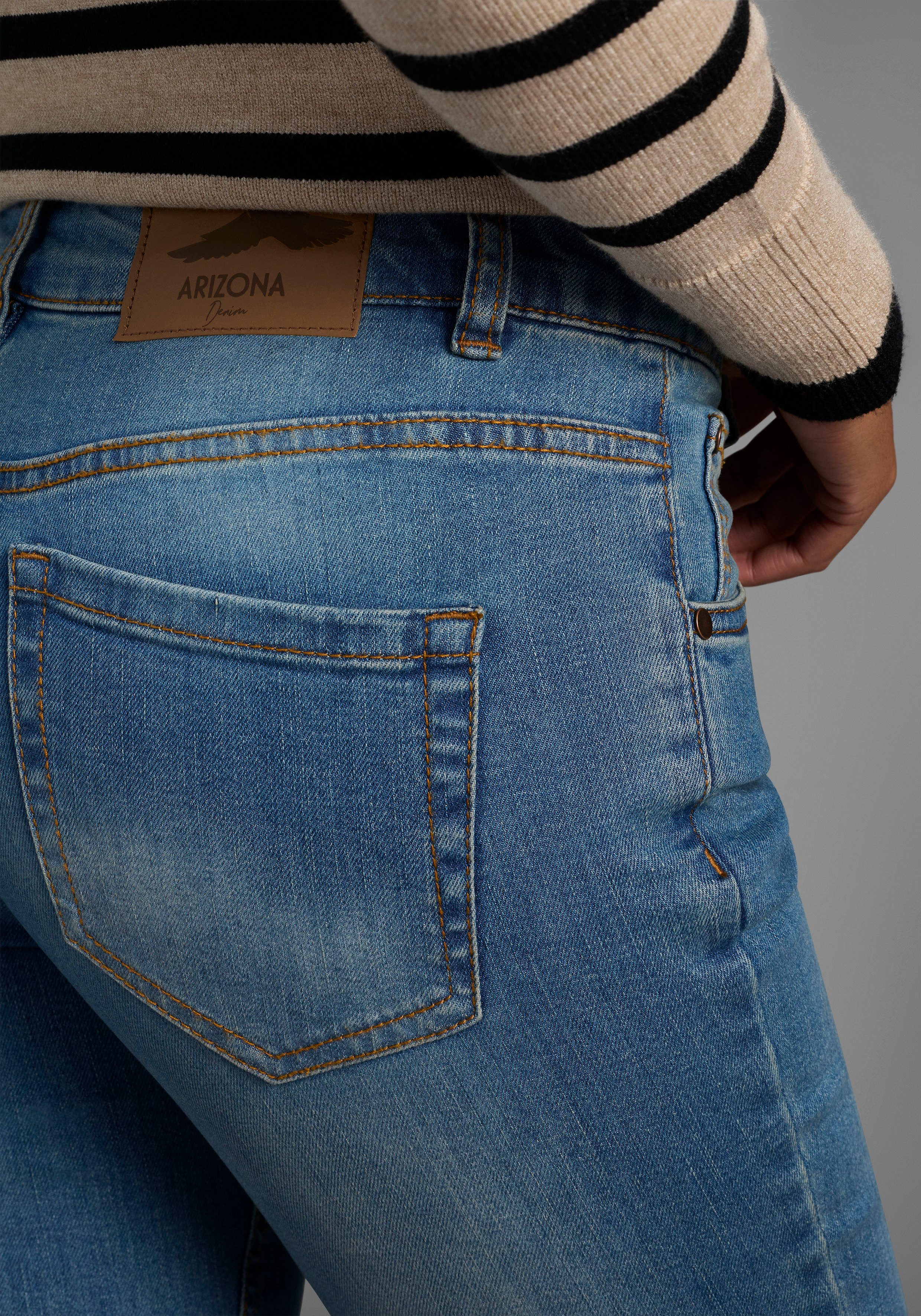 Arizona Slim-fit-Jeans Bund mit seitlichem Gummizugeinsatz schmale Passform, Röhrenjeans, Used-Waschung, hohe Leibhöhe