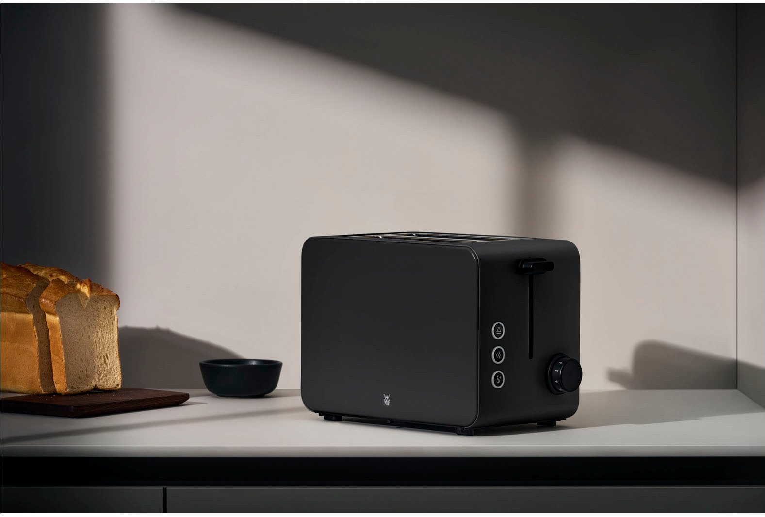 WMF Toaster Stelio Edition Deep Black, 2-Scheiben-Toaster mit Brötchenaufsatz, 2 kurze Schlitze, für 2 Scheiben, 1050 W, 7 Bräunungsstufen, Brotzentrierung, Krümelschublade, Cromargan Gehäuse