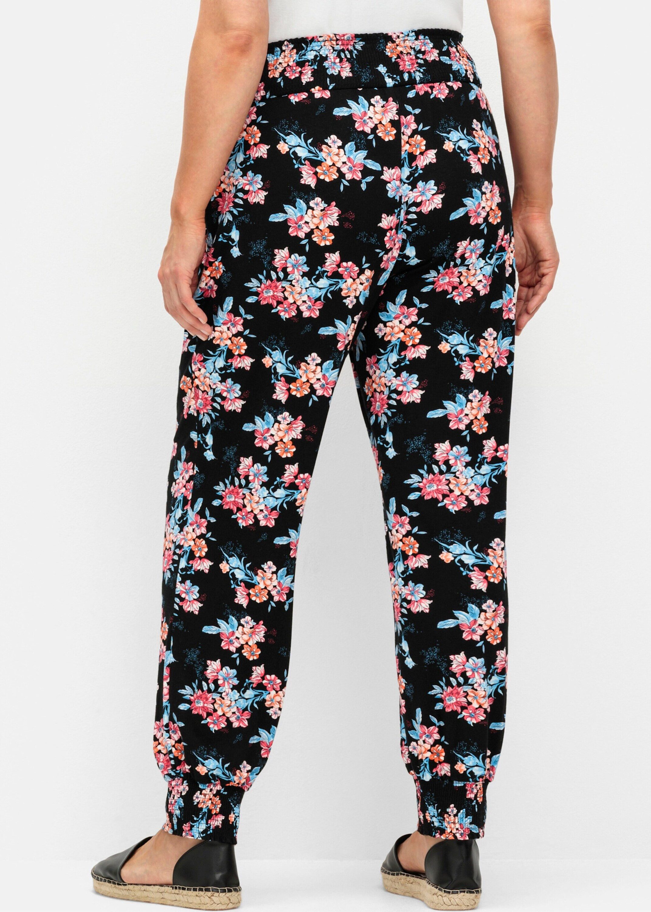Sheego Jerseyhose Schlupfhose mit Blumendruck und Smok-Abschlüssen günstig online kaufen